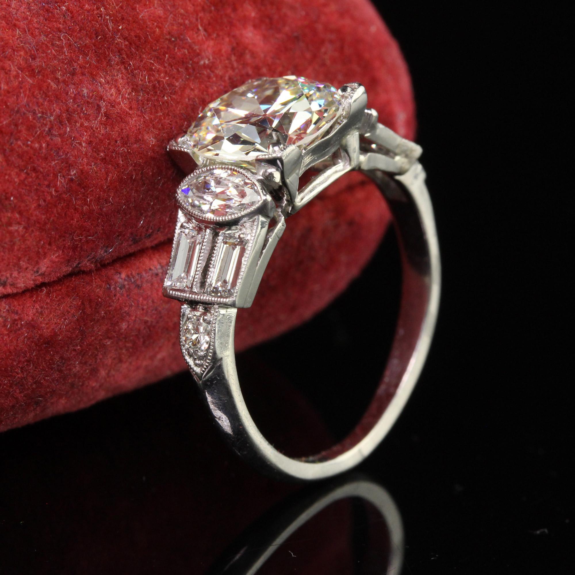 Old European Cut Antique Art Deco Platinum Old European Diamond Marquise Baguette Engagement Ring For Sale