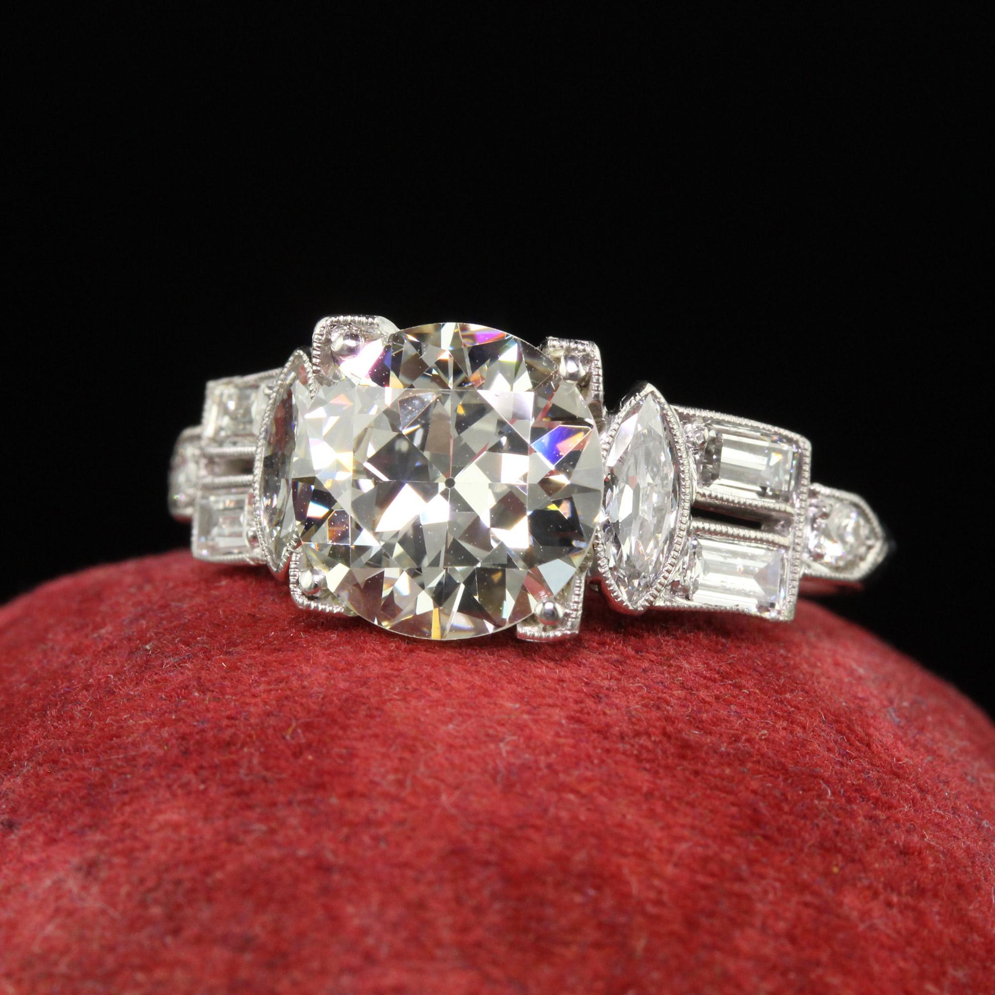 Antique Art Deco Platinum Old European Diamond Marquise Baguette Engagement Ring In Good Condition For Sale In Great Neck, NY