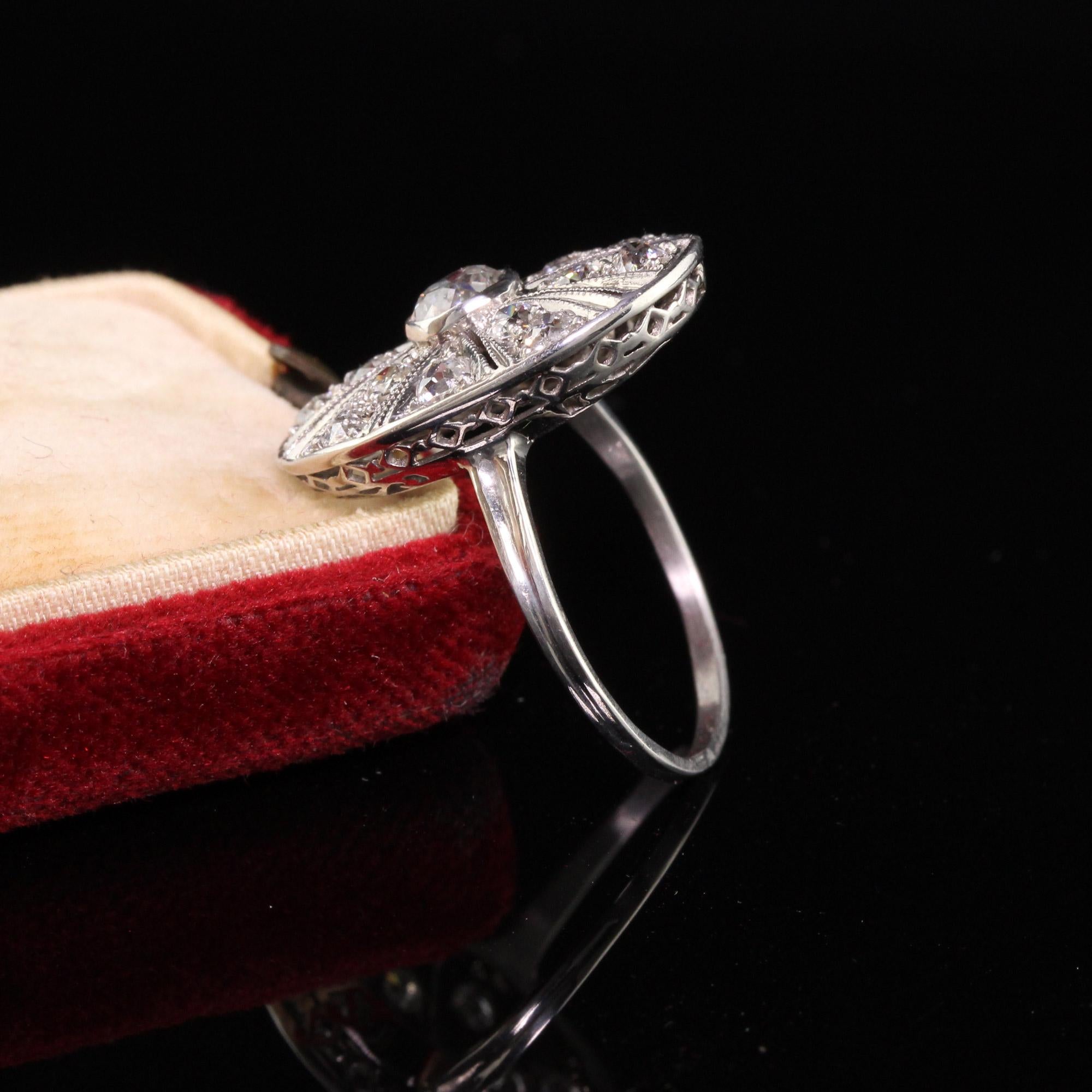 Beautiful Antique Art Deco Platinum Old European Diamond Oval Shield Ring. This gorgeous shield ring features old european cut diamonds in a sun burst pattern with amazing filigree work.

Item #R0902

Metal: Platinum

Weight: 4.8 Grams

Diamond: