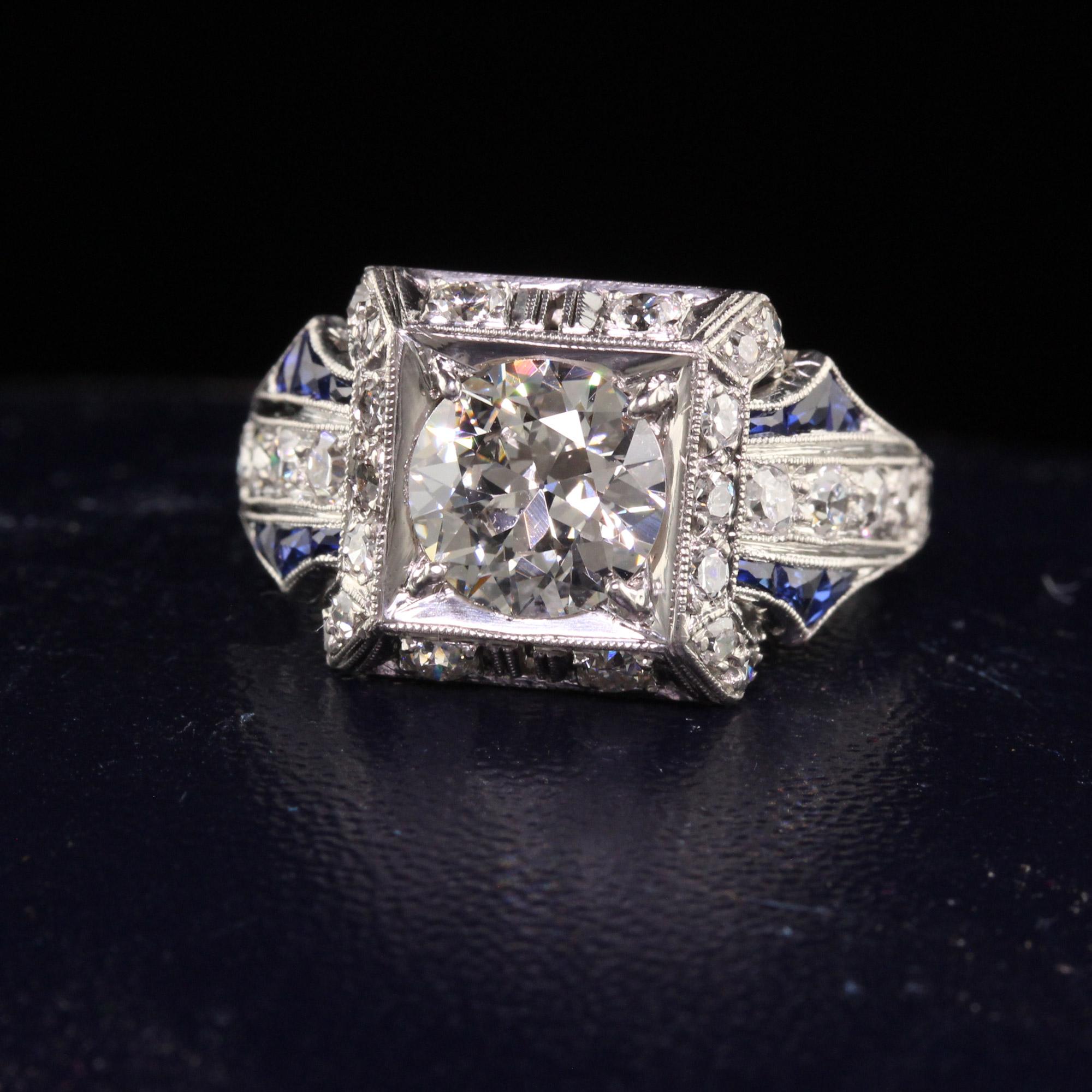 Beautiful Antique Art Deco Platinum Old European Diamond Sapphire Engagement Ring - GIA. This incredible engagement ring is crafted in platinum. The center holds a gorgeous old european cut diamond that has a GIA report. The mounting is a work of
