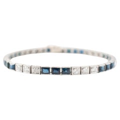 Bracelet tennis ancien Art déco en platine avec diamants et saphirs d'Europe ancienne