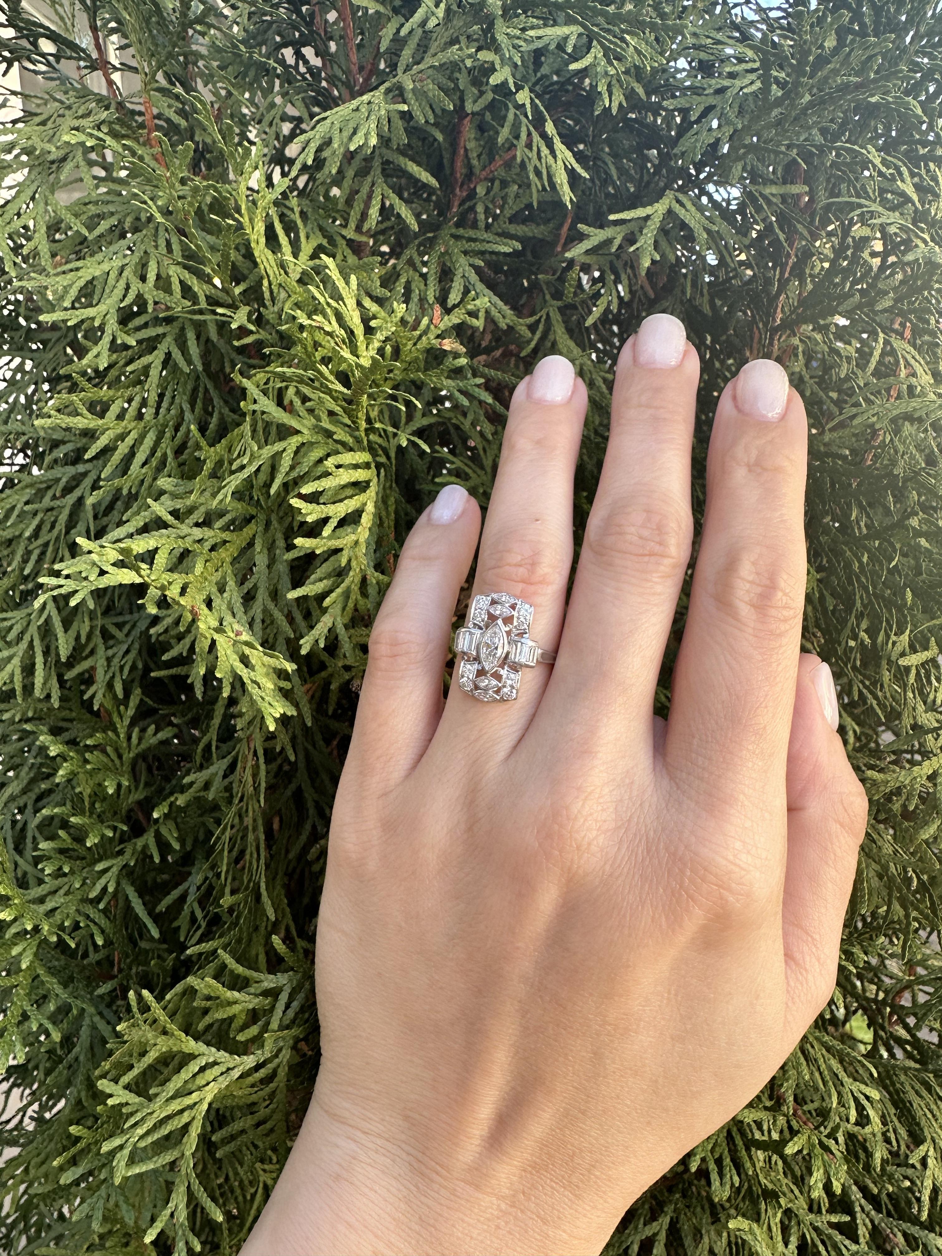 --Stone(s):--
(1) Natural Genuine Diamond - Old Marquise Cut - Bezel Set - VS2 Clarity / G Color - 0.50ct (approx.)
(18) Natural Genuine Diamonds - Old Marquise, Baguette & Round Cut - Pavé, Bezel & Channel Set - 0.80ctw (approx.)
Total Carat