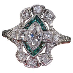 Ancienne bague bouclier Art déco en platine avec diamants taille ancienne marquise et émeraude
