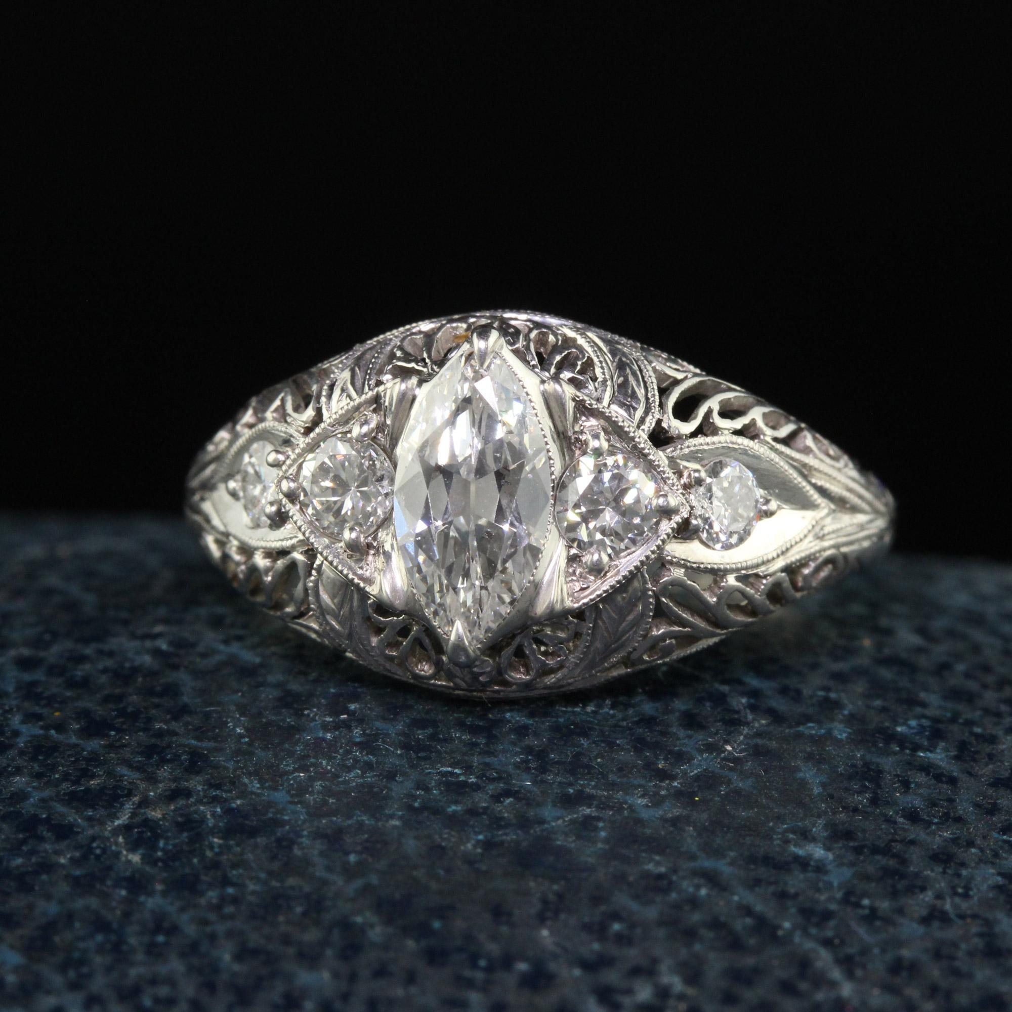 Beautiful Antique Art Deco Platinum Old Marquise Cut Diamond Engagement Ring - GIA. This gorgeous engagement ring is crafted in platinum. The center holds a beautiful old cut marquise diamond and has old European cut diamonds on the sides. They are