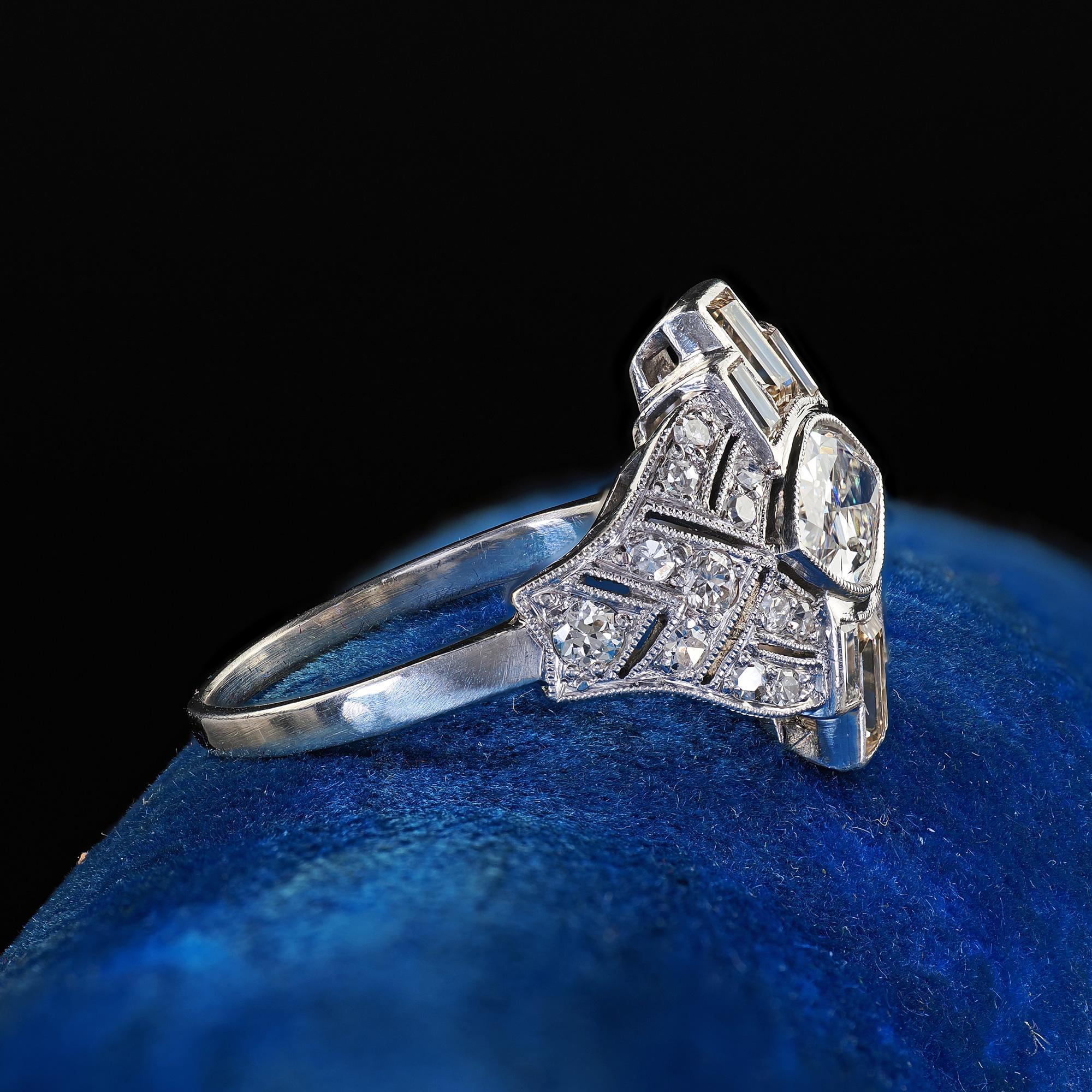 Antique Art Deco Platinum Old Marquise Diamond Baguette Engagement Ring In Good Condition For Sale In Great Neck, NY