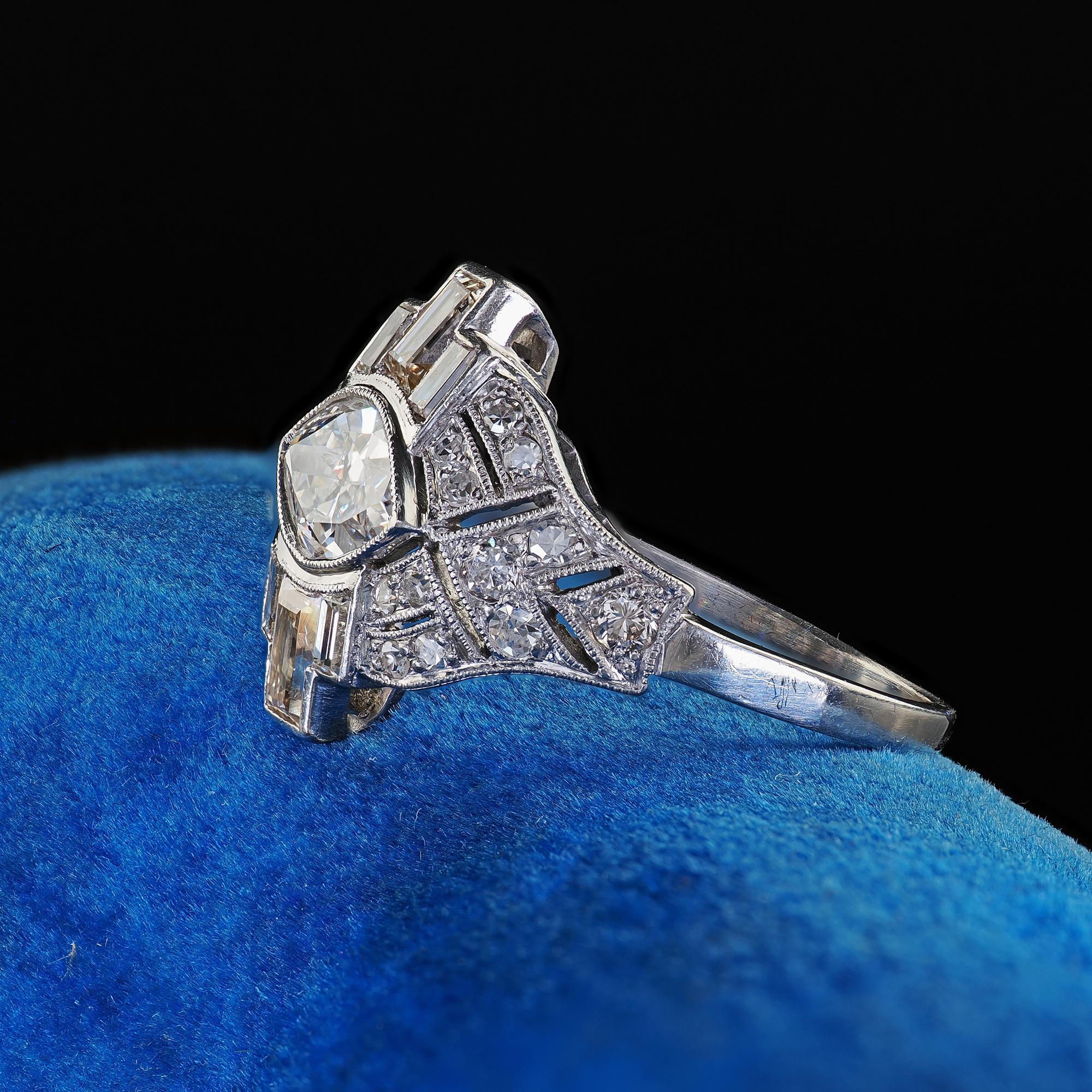 Women's Antique Art Deco Platinum Old Marquise Diamond Baguette Engagement Ring For Sale