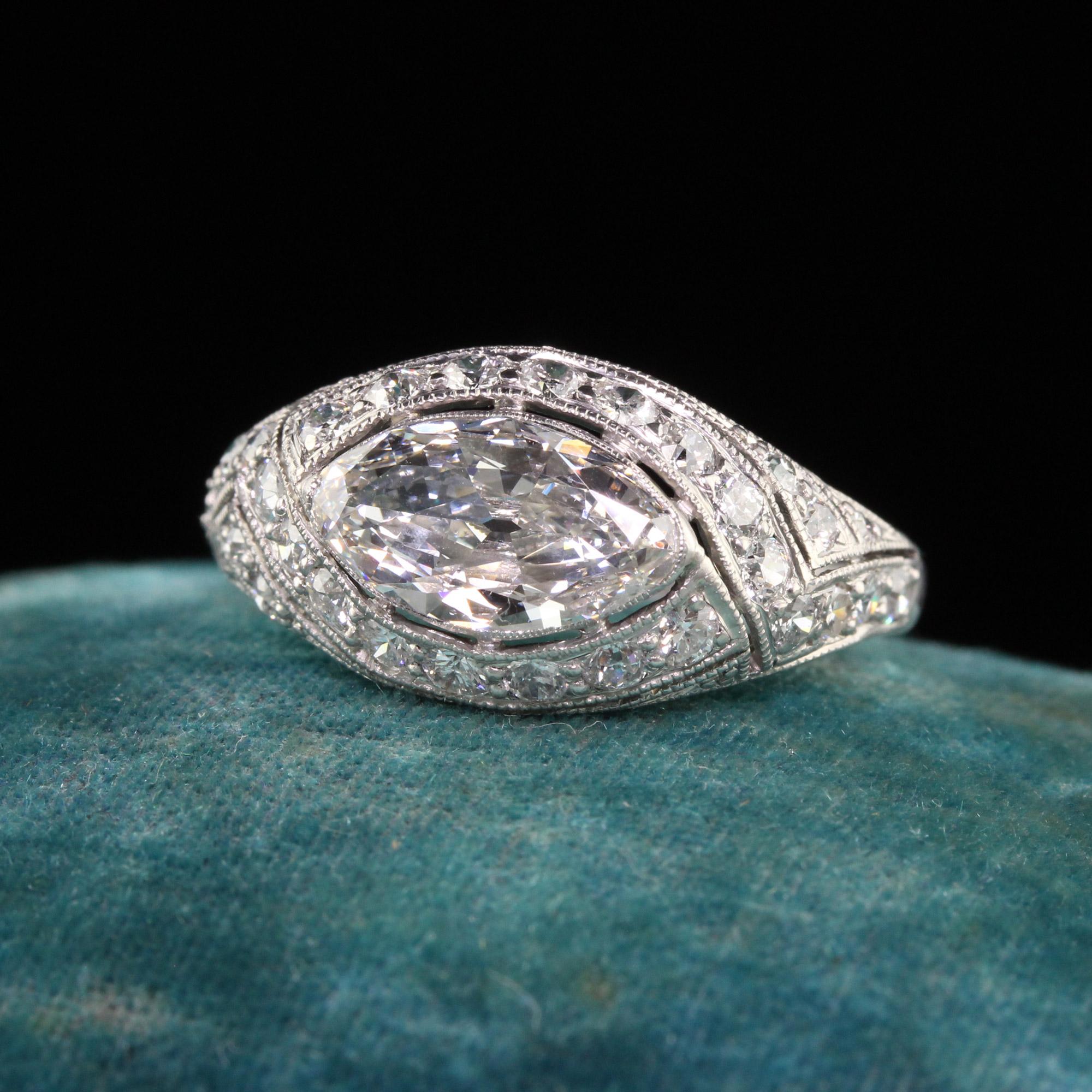 Beautiful Antique Art Deco Platinum Old Marquise Diamond Filigree Engagement Ring - GIA. This gorgeous engagement ring is crafted in platinum. The center holds an old marquise cut diamond that is GIA certified. This gorgeous diamond is set in an art