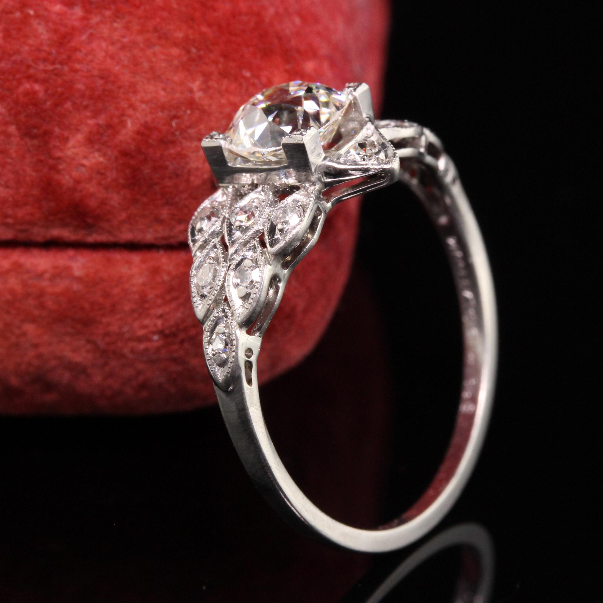 Beautiful Antique Art Deco Platinum Old Mine Cut Diamond Engagement Ring. This beautiful art deco diamond engagement ring features a gorgeous old mine cut diamond in the center of a beautiful art deco mounting with single cut diamonds on all