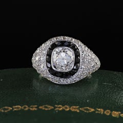 Antique Art Deco Platinum Old Mine Diamond and French Onyx Halo Engagement Ring