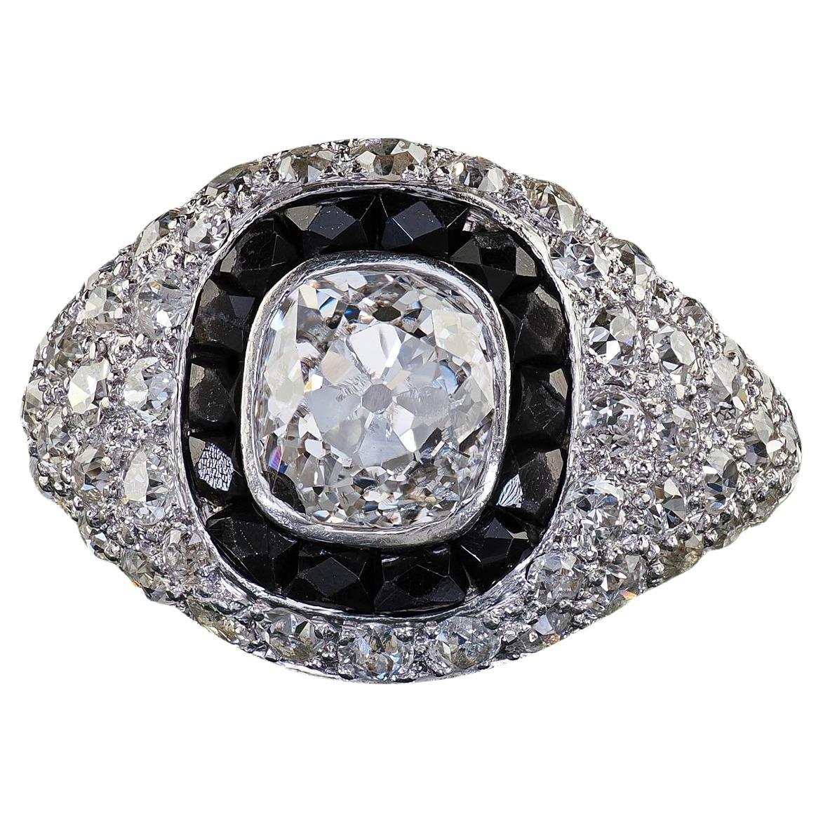 Antico anello di fidanzamento aureolato in platino Art Deco con diamanti Mine e onice francese