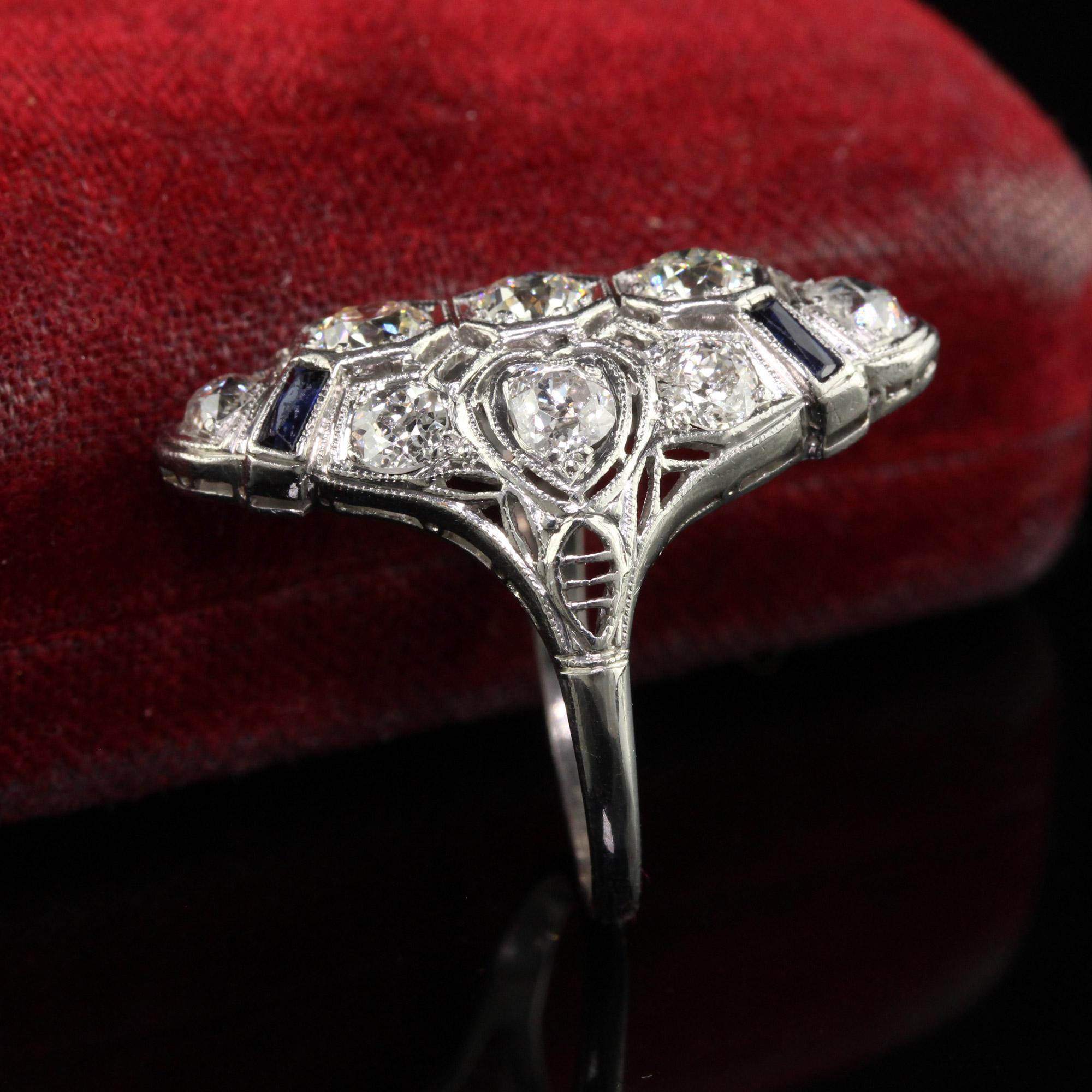 Old Mine Cut Antique Art Deco Platinum Old Mine Diamond and Sapphire Filigree Shield Ring For Sale
