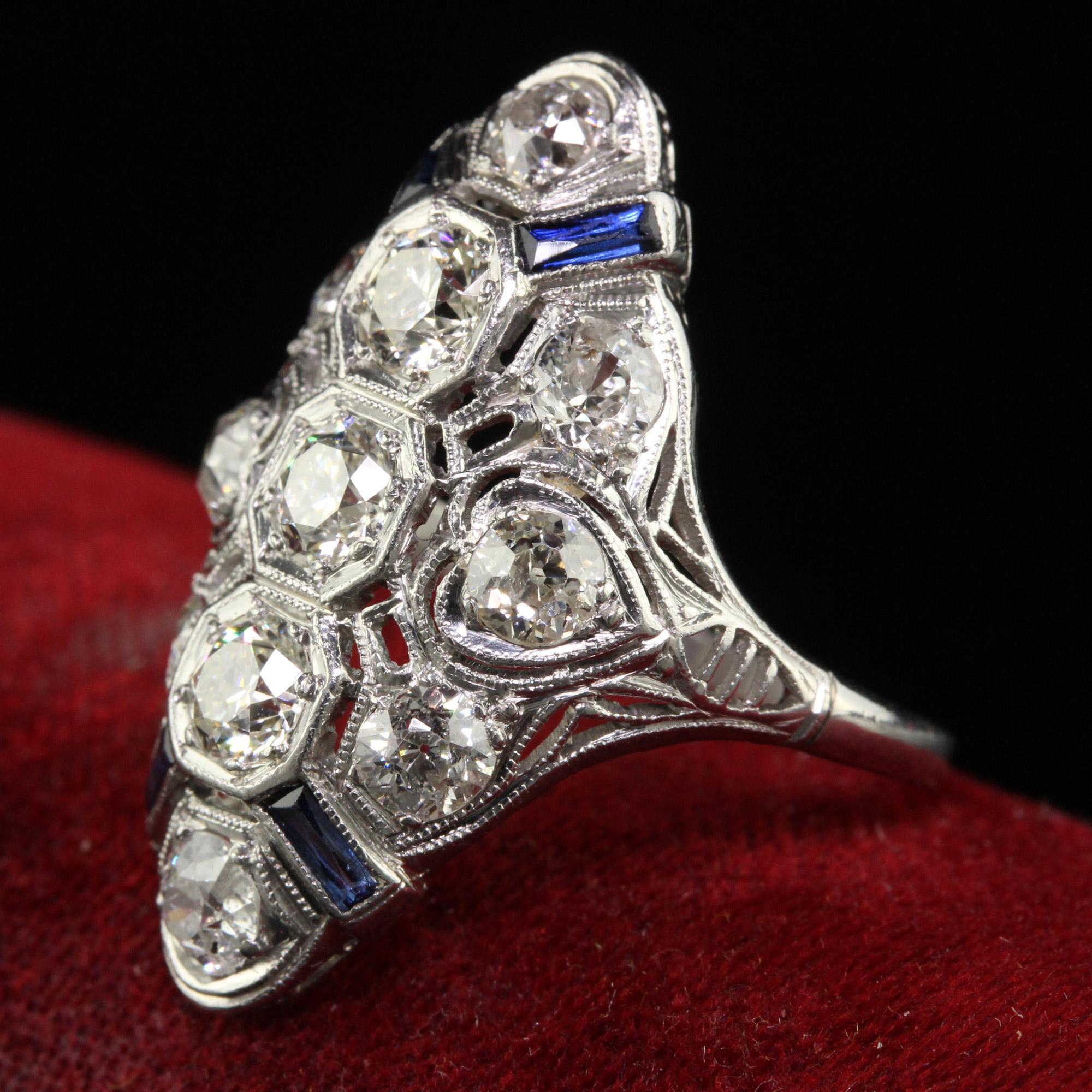 Antique Art Deco Platinum Old Mine Diamond and Sapphire Filigree Shield Ring In Good Condition For Sale In Great Neck, NY