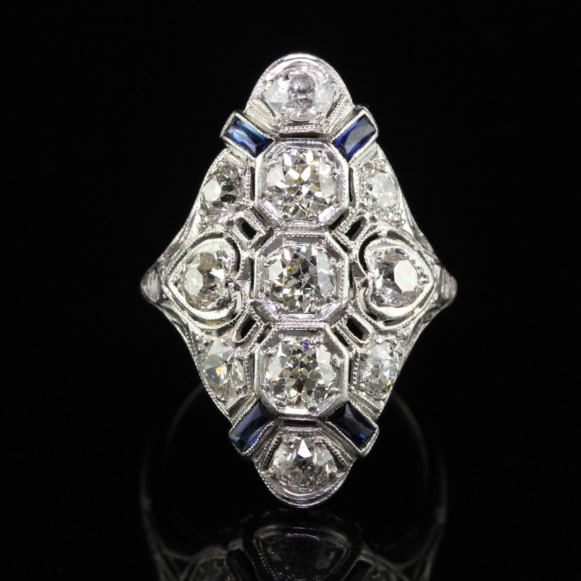 Women's Antique Art Deco Platinum Old Mine Diamond and Sapphire Filigree Shield Ring For Sale