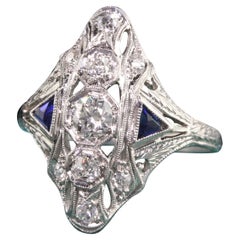 diamond art Antique Art Deco Platinum Old Mine Diamond and Sapphire Shield Ring