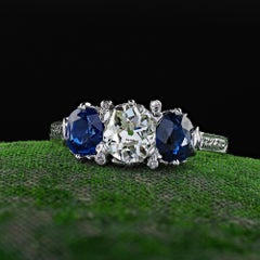 Antique Art Deco Platinum Old Mine Diamond and Sapphire Three Stone Ring