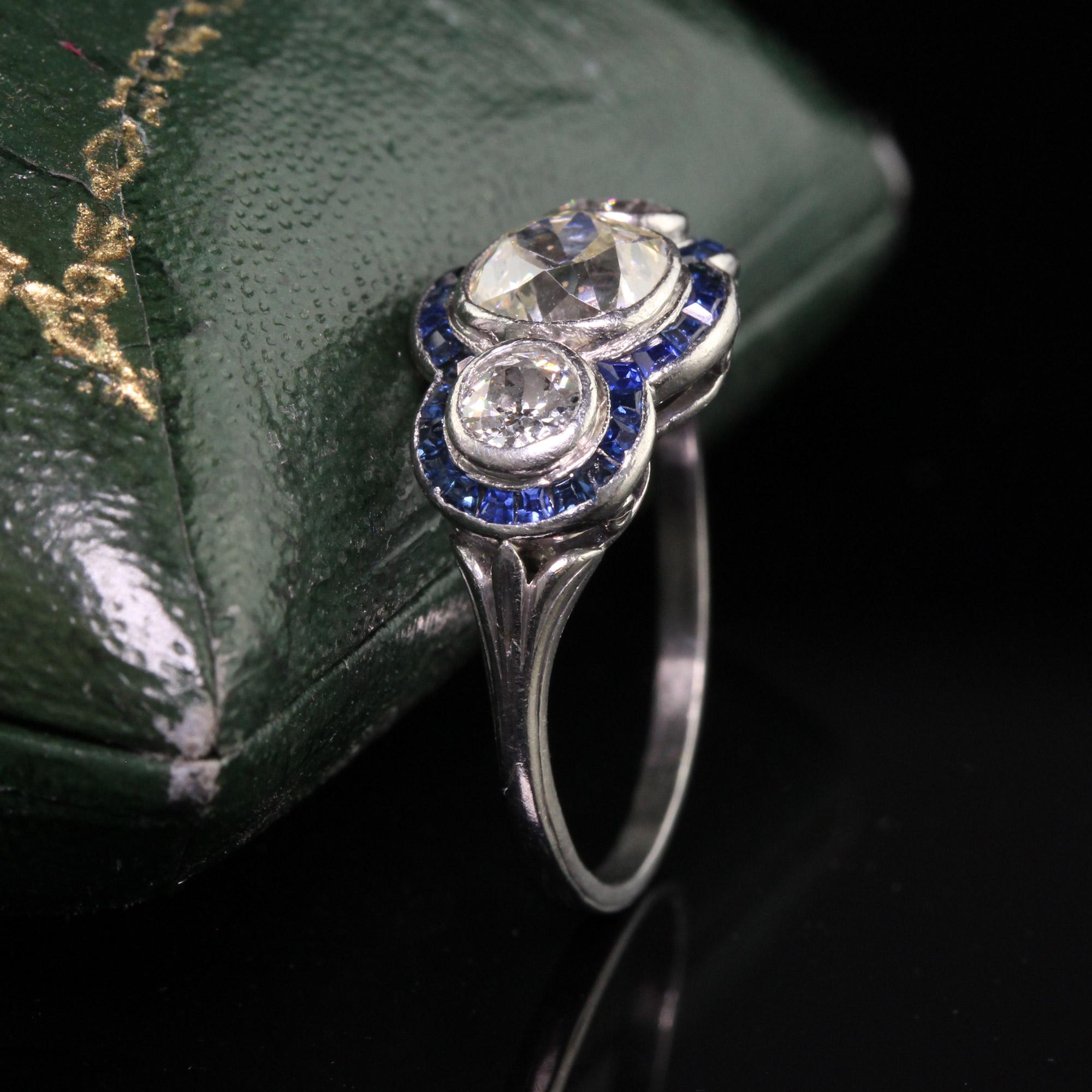 Old Mine Cut Antique Art Deco Platinum Old Mine Diamond and Sapphire Three Stone Ring For Sale