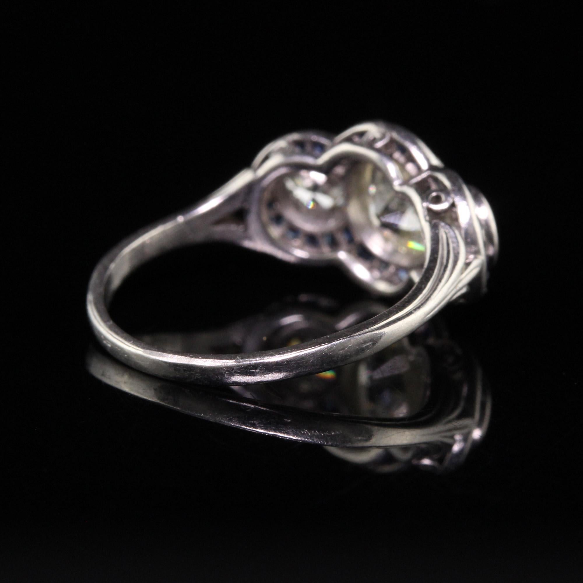 Women's Antique Art Deco Platinum Old Mine Diamond and Sapphire Three Stone Ring For Sale