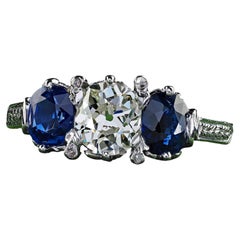 Antique Art Deco Platinum Old Mine Diamond and Sapphire Three Stone Ring