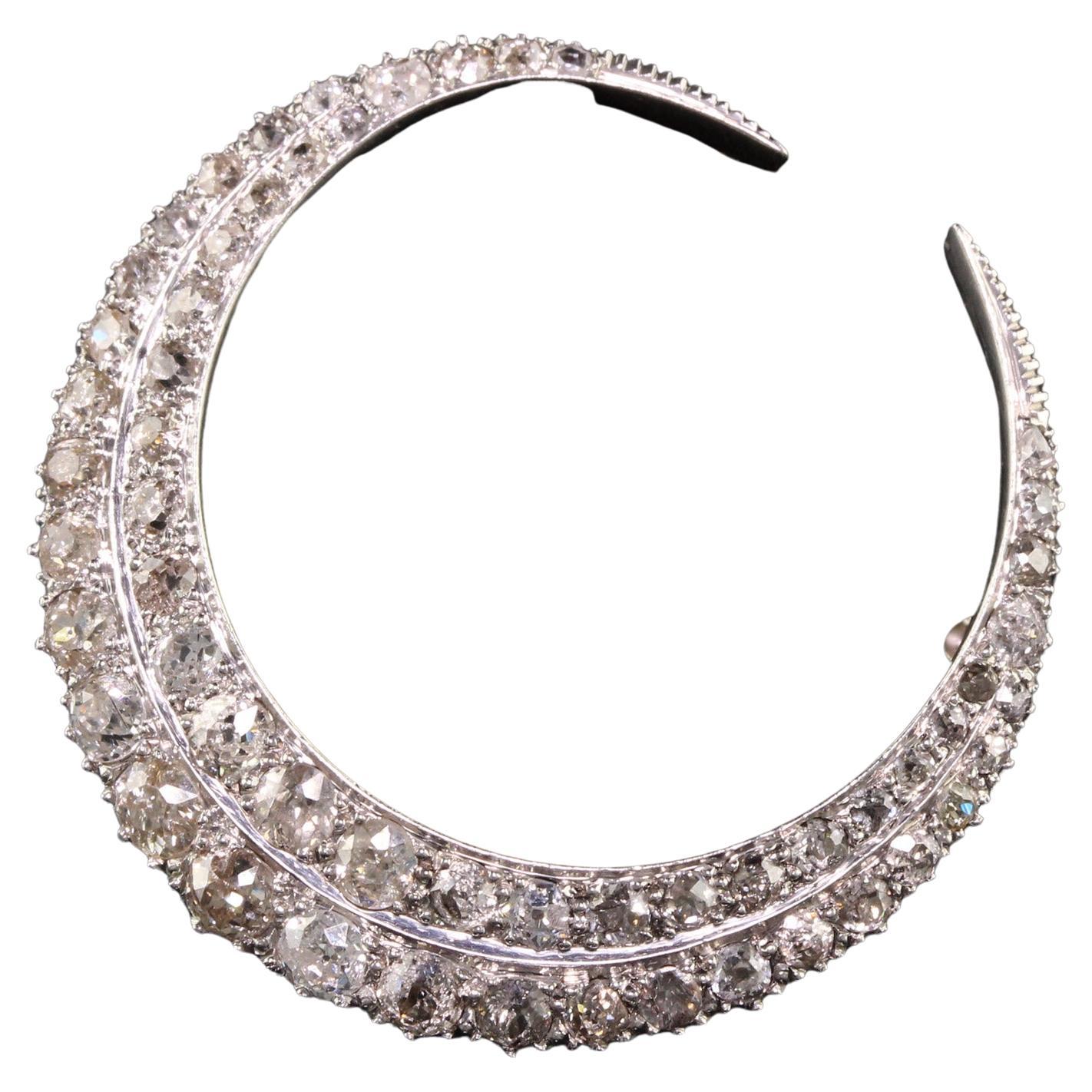Beautiful Antique Art Deco Platinum Old Mine Diamond Crescent Pin. This gorgeous pin is crafted in platinum and the closing pin is crafted in 14k white gold. This beautiful pin has old mine diamonds in varying sizes and qualities set in platinum and