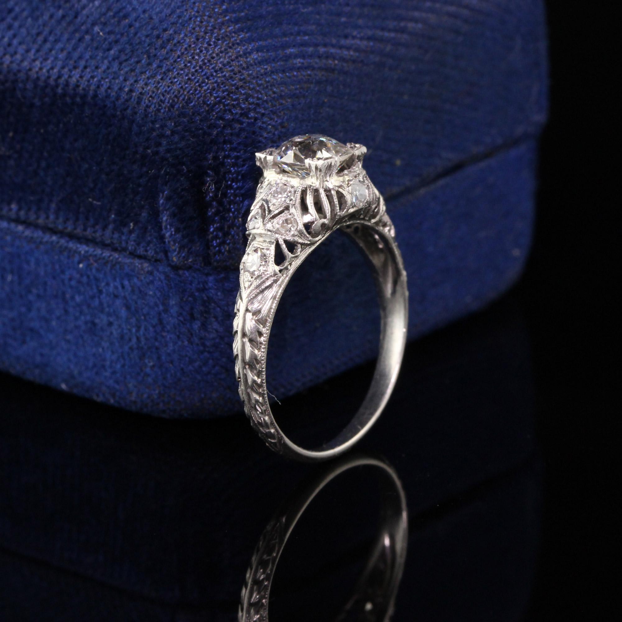 Beautiful Antique Art Deco Platinum Old Mine Diamond Engagement Ring. This beautiful engagement ring has a white old mine cut diamond in the center of a pristine filigree art deco platinum mounting. Truly a stunner.

Item #R0723

Metal: