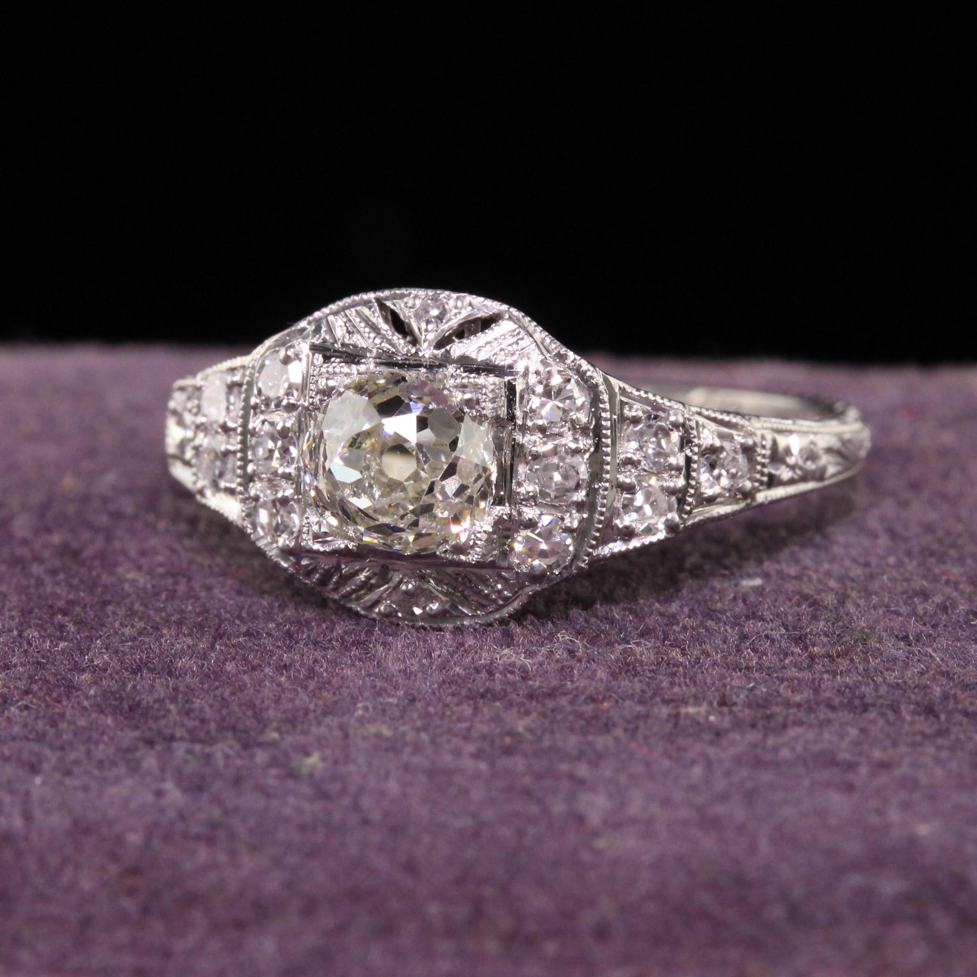 Beautiful Antique Art Deco Platinum Old Mine Diamond Engagement Ring - GIA. This gorgeous engagement ring has a GIA certified old mine cut diamond in the center of an Art Deco mounting that sits low on the finger. The ring is in great