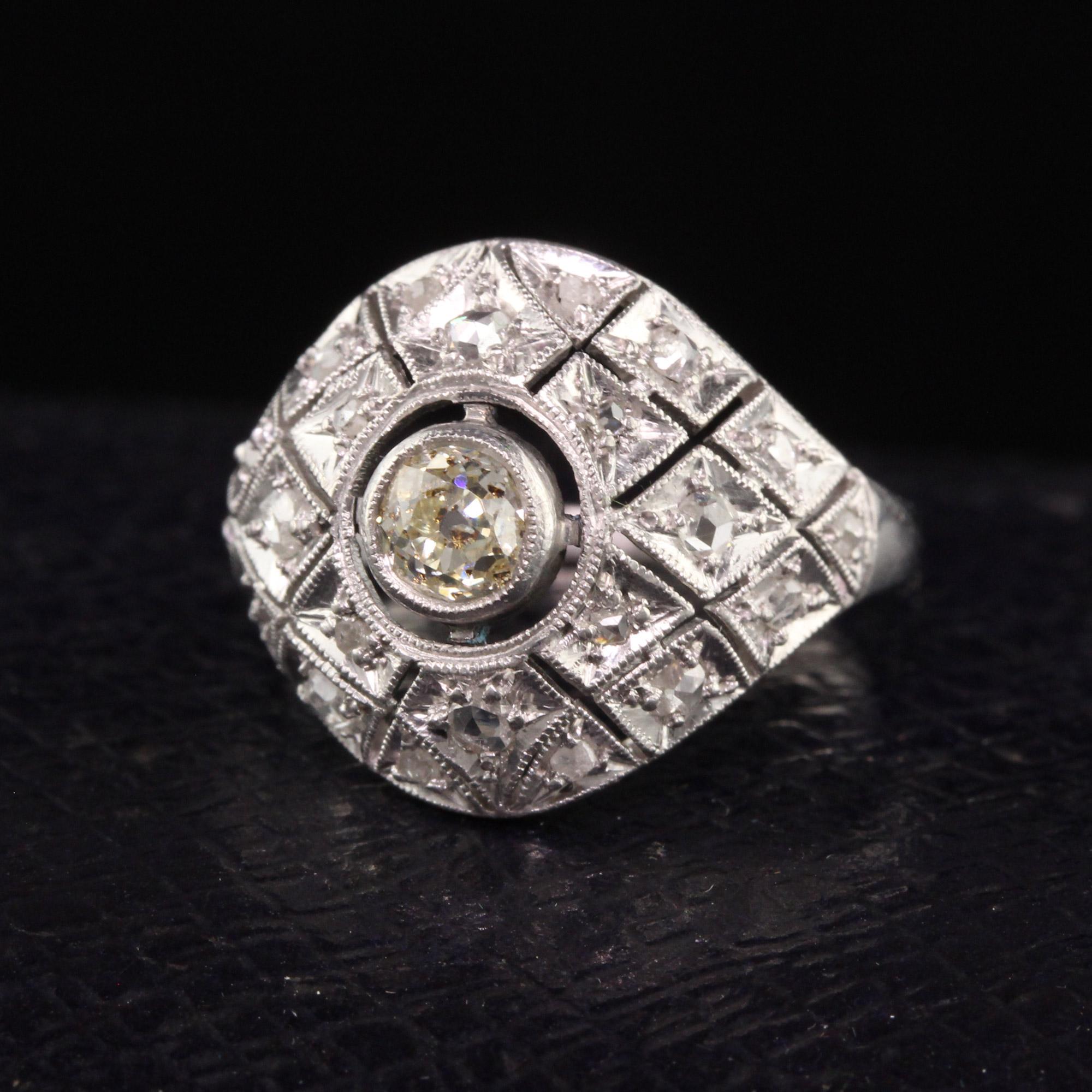 Beautiful Antique Art Deco Platinum Old Mine Diamond Filigree Domed Ring. This gorgeous ring features an old mine cut diamond in the center with rose cut diamonds on the rest of the ring.

Item #R1071

Metal: Platinum

Weight: 4.1 Grams

Size: 5