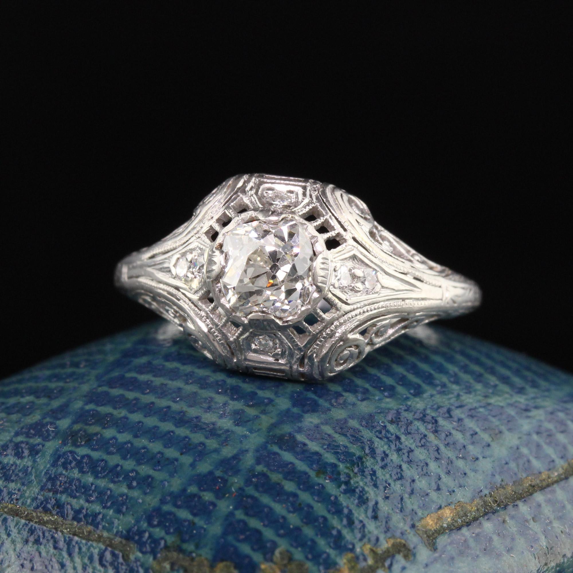 Beautiful Antique Art Deco Platinum Old Mine Diamond Filigree Engagement Ring. This classic style art deco engagement ring features an old mine cut diamond in the center on a filigree mounting.

Item #R1074

Metal: Platinum

Weight: 2.9 Grams

Size:
