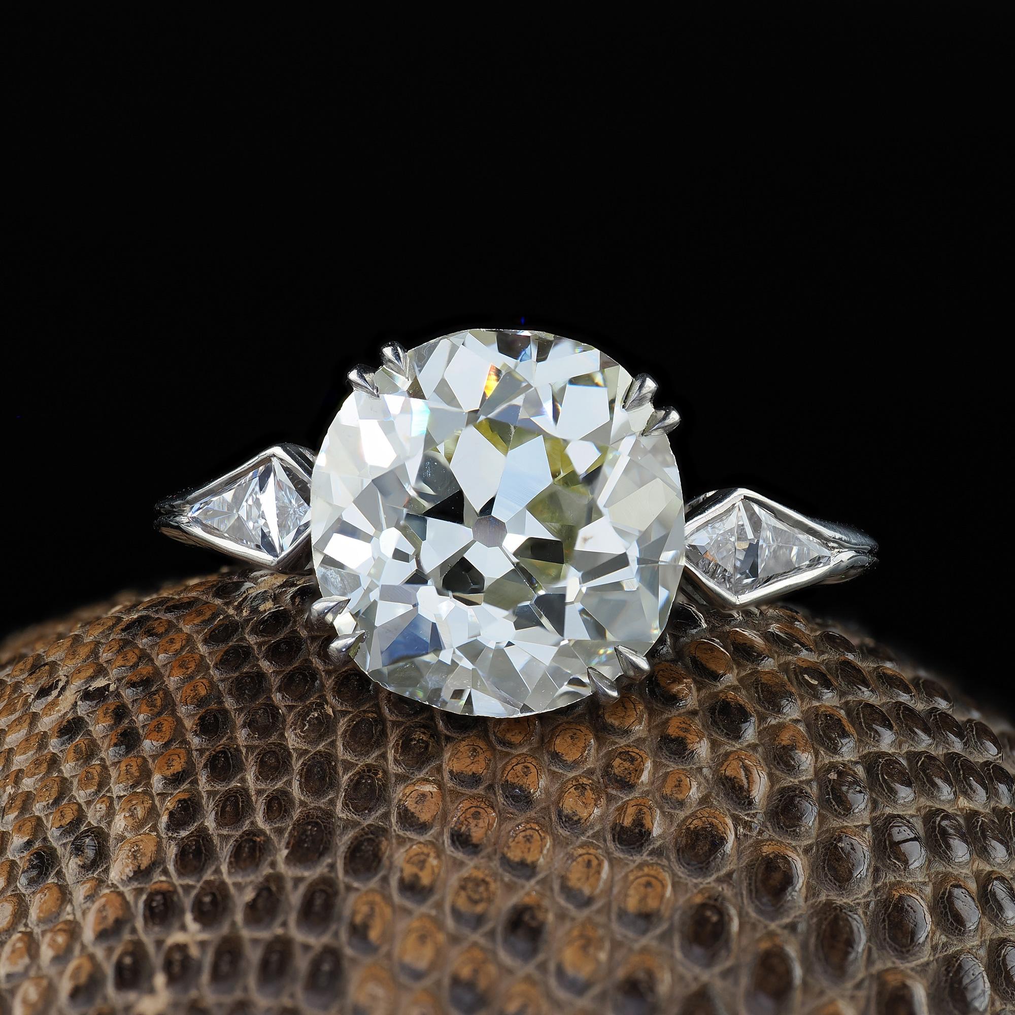 Beautiful Antique Art Deco Platinum Old Mine Diamond French Cut Engagement Ring - GIA. This incredible old mine diamond engagement ring is crafted in platinum. The ring features a gorgeous old mine cut diamond in the center that has a GIA report.