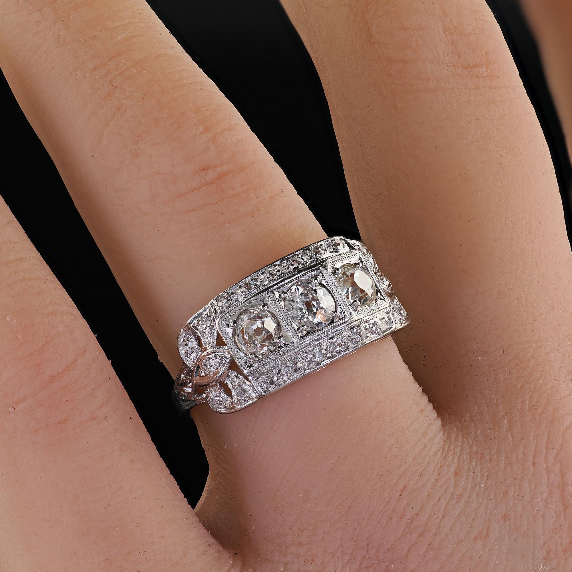 Antique Art Deco Platinum Old Mine Diamond Three Stone Ribbon Motif Ring For Sale 5