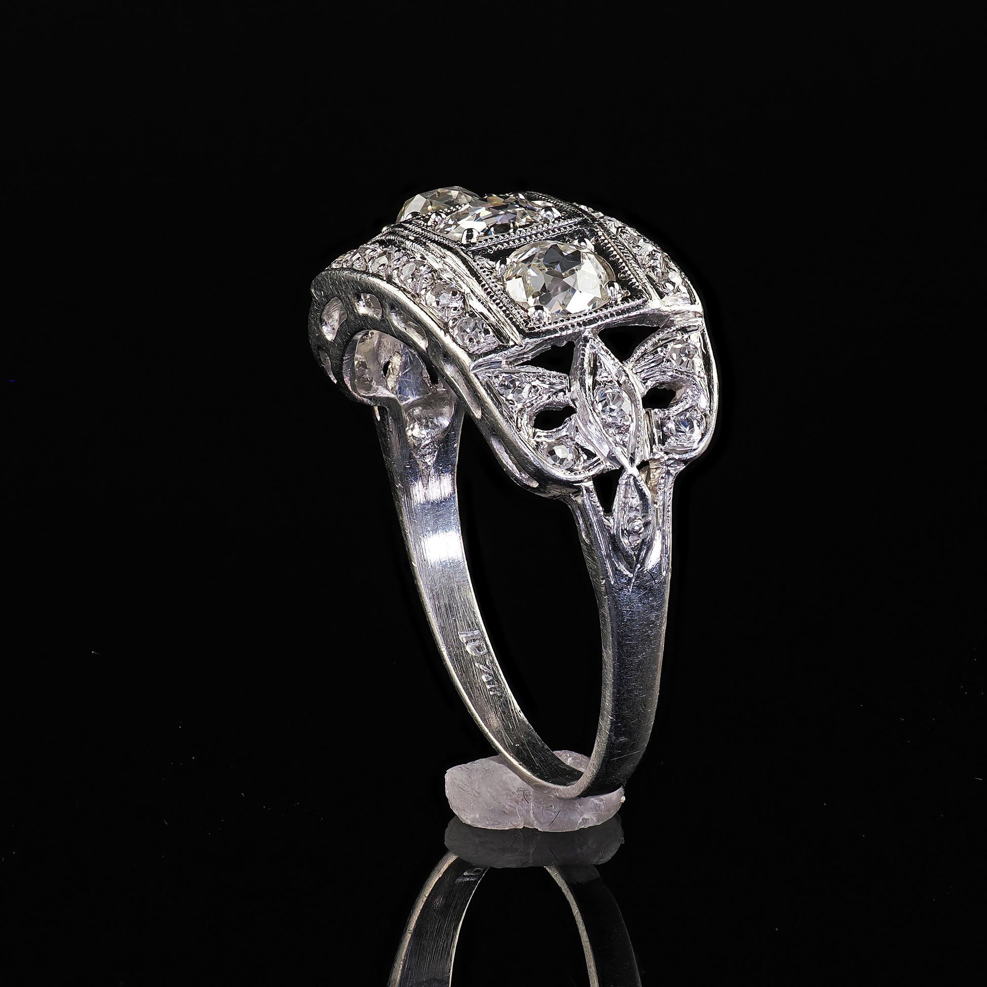 Antique Art Deco Platinum Old Mine Diamond Three Stone Ribbon Motif Ring For Sale 4