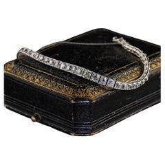 Bracciale da tennis antico Art Deco in platino con diamanti graduati e incisi