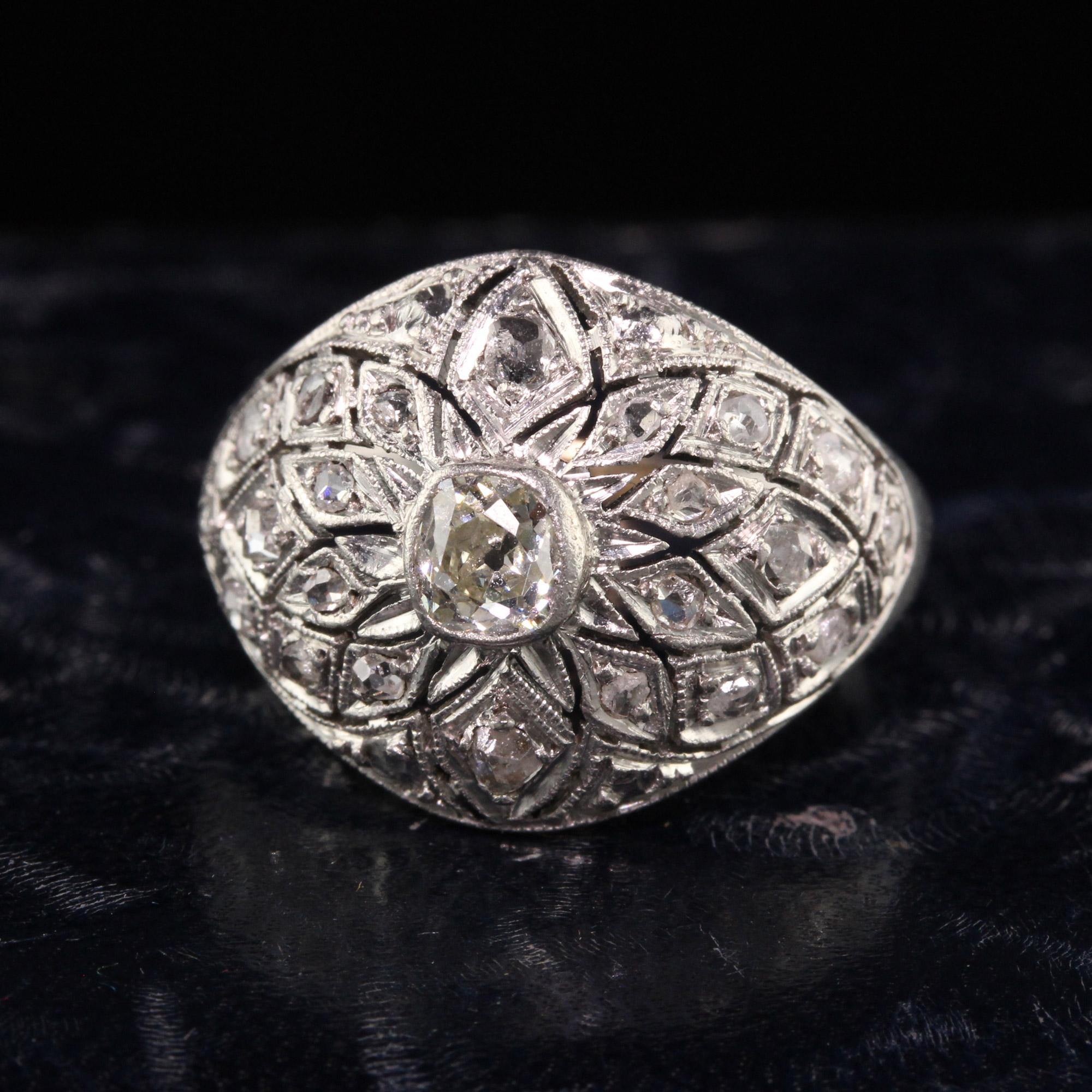 Beautiful Antique Art Deco Platinum Old Mine Rose Cut Diamond Domed Ring. This gorgeous art deco ring is crafted in platinum. The center holds an old mine cut diamonds and is surrounded by rose cut diamonds.

Item #R1221

Metal: Platinum

Weight: