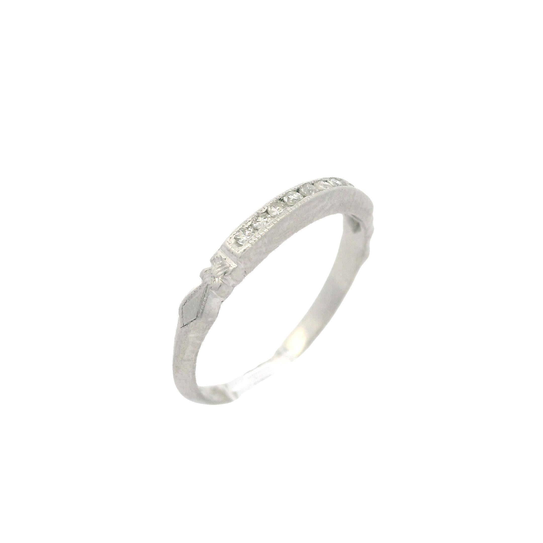 --Stone(s):--
(10) Natural Genuine Diamonds - Old Single Cut - Channel Set - Nice White Color

Material: Solid Platinum
Weight: 1 Gram
Ring Size: 3.5 (Fitted on a finger. We can custom size this ring, although the engraving inside will be removed -