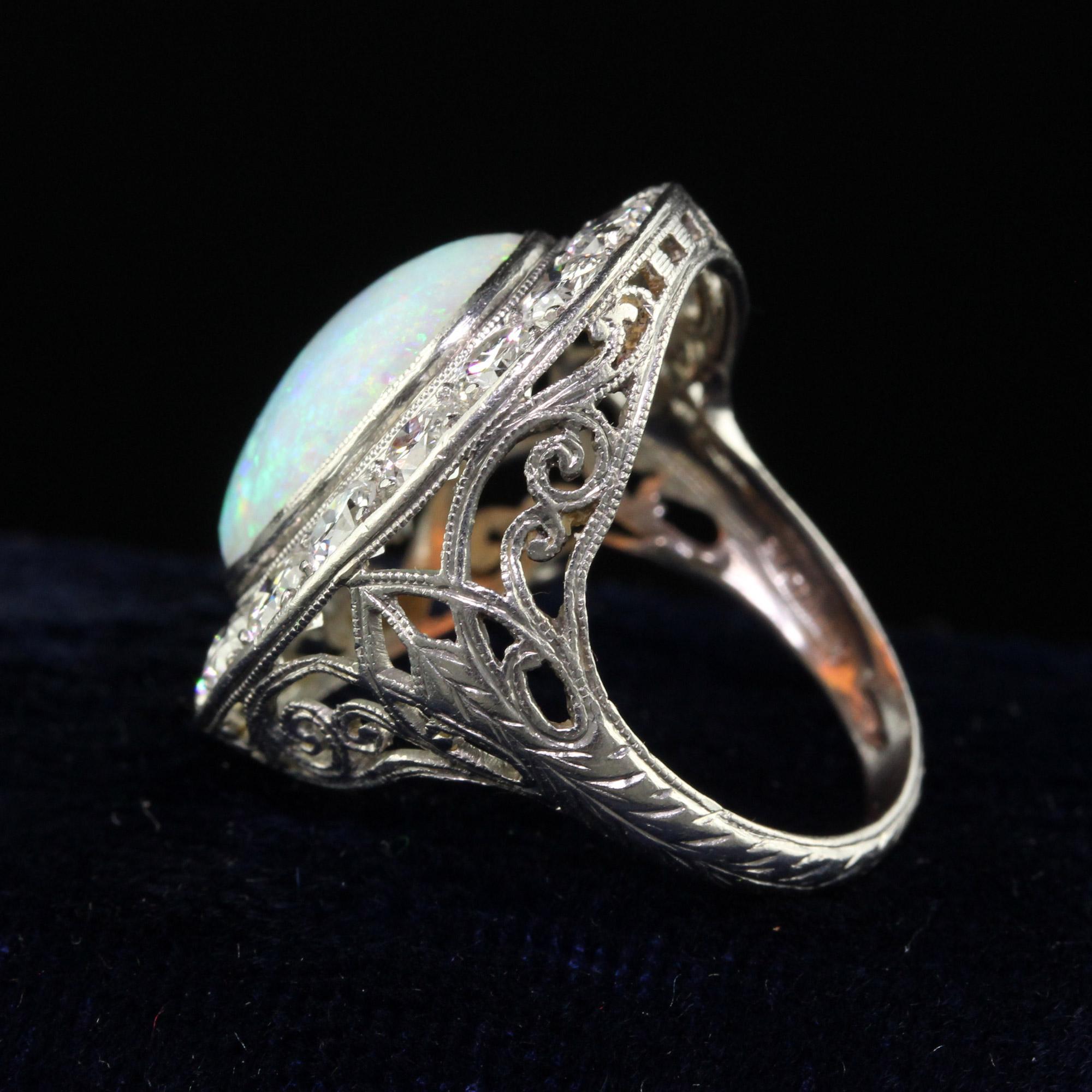 Antique Art Deco Platinum Opal and Old Euro Diamond Halo Cocktail Ring In Good Condition For Sale In Great Neck, NY