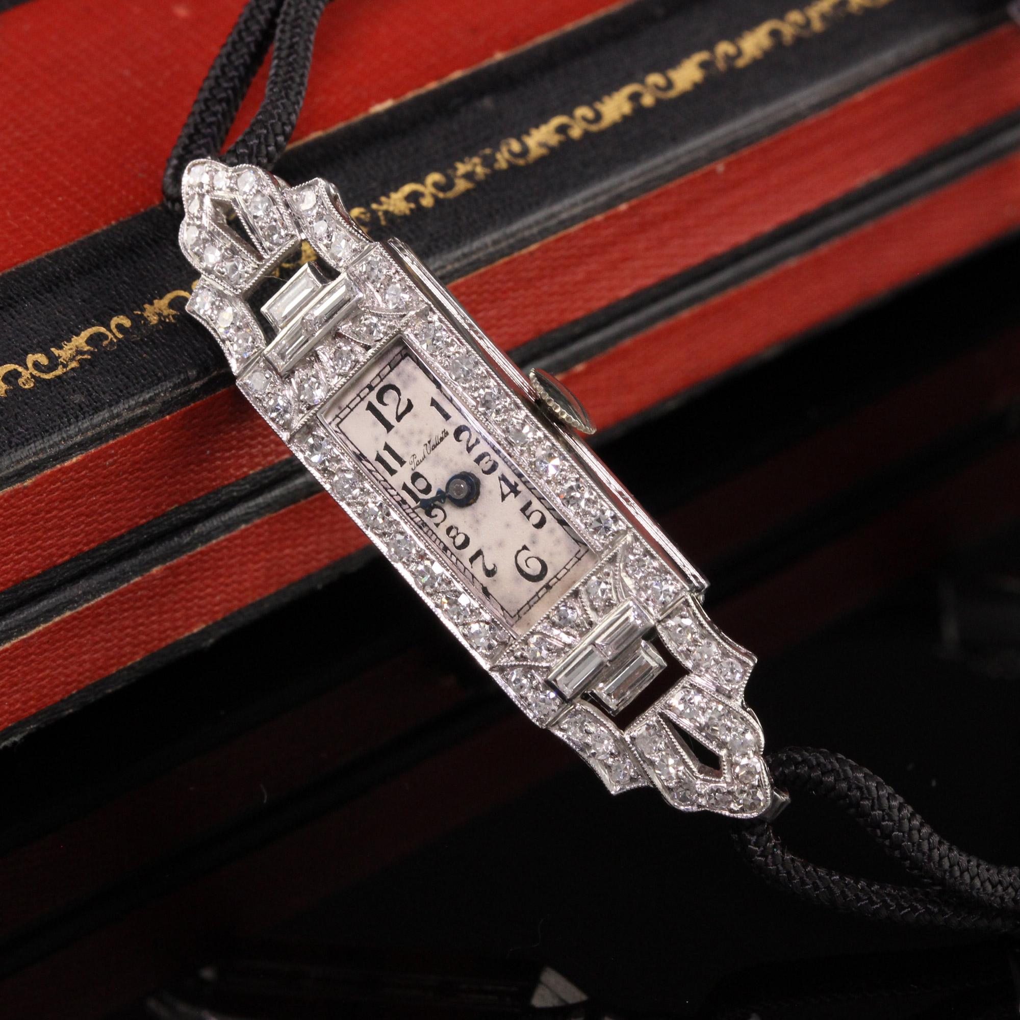 Beautiful Antique Art Deco Paul Vallette Diamond Baguette Evening Watch. This beautiful watch is in amazing condition and is running. The band of the watch is a cord with a base metal buckle.

Item #W0005

Metal: Platinum

Weight: 14.8