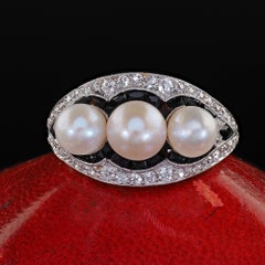 Antique Art Deco Platinum Pearl Diamond and Onyx Three Stone Cocktail Ring