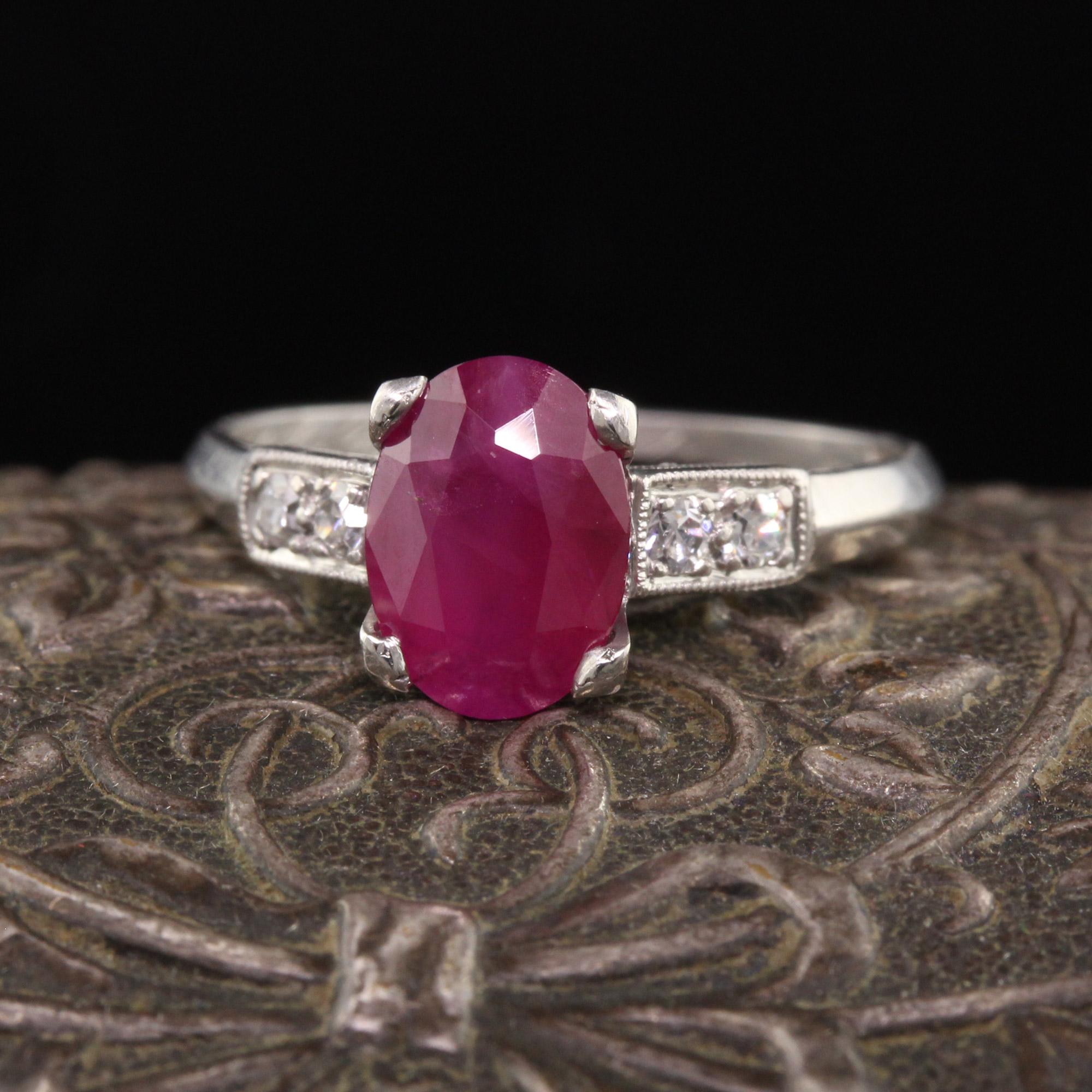 Beautiful Antique Art Deco Platinum Ruby and Diamond Engagement Ring. This beautiful engagement ring has a red ruby in the center of a beautiful art deco mounting. It's stunning!

Item #R1098

Metal: Platinum

Weight: 2.7 Grams

Size: 5

Diamond: