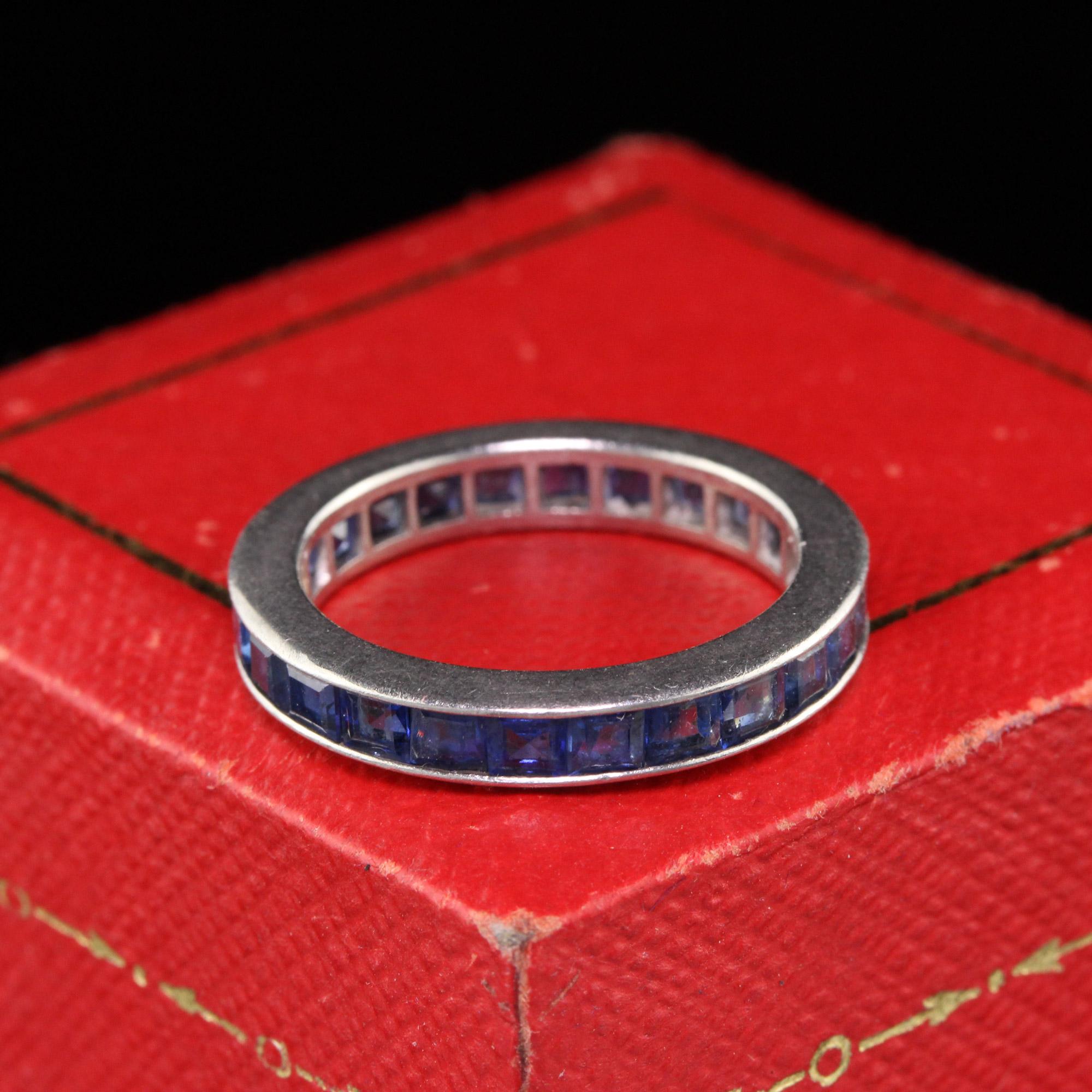 Beautiful classic Art Deco eternity band done in platinum with sapphires. The sapphires are a beautiful shade of blue which create bright look. The ring is in good condition. 

#R0408

Metal: Platinum 

Weight: 4.5 Grams

Ring Size: 5