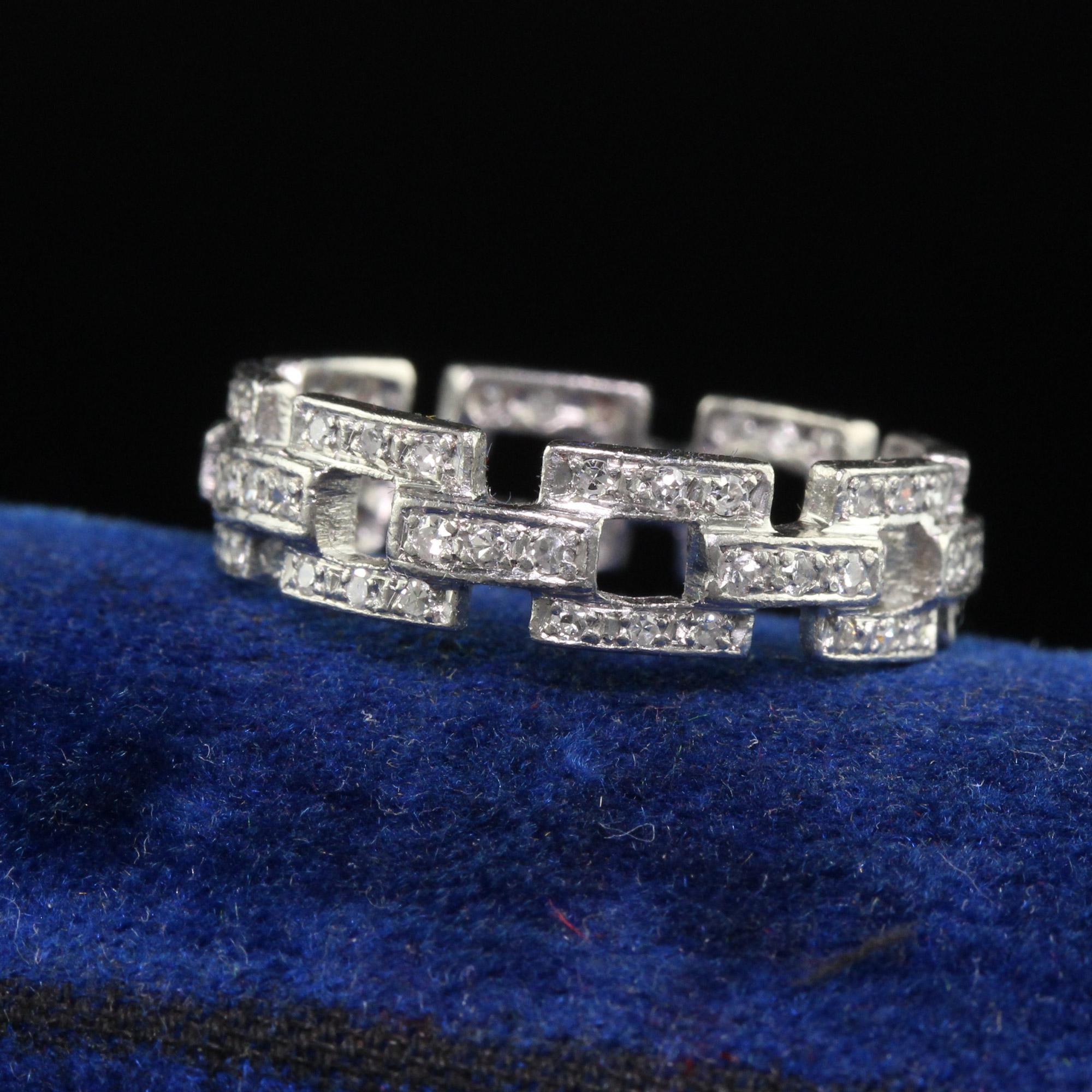 Beautiful Antique Art Deco Platinum Single Cut Diamond Buckle Eternity Band - Size 6 3/4. This beautiful wedding band is crafted in platinum. The ring has single cut diamonds going around the entire ring in a buckle pattern. The ring is in good