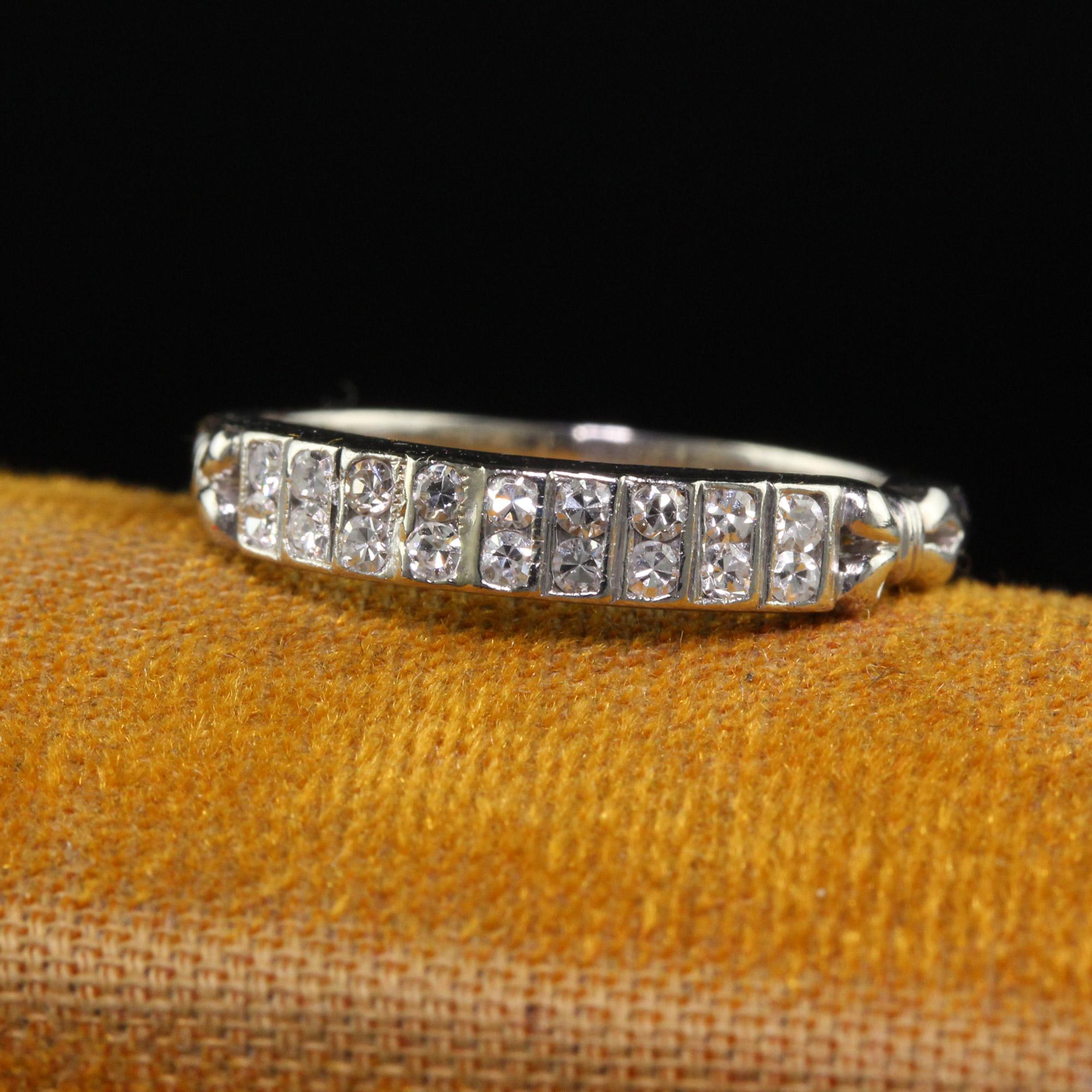 Beautiful Antique Art Deco Platinum Single Cut Diamond Double Row Wedding Band. This beautiful wedding band is crafted in platinum. The top of the ring has two rows of single cut diamonds and has a beautiful design on both sides. The ring is in good
