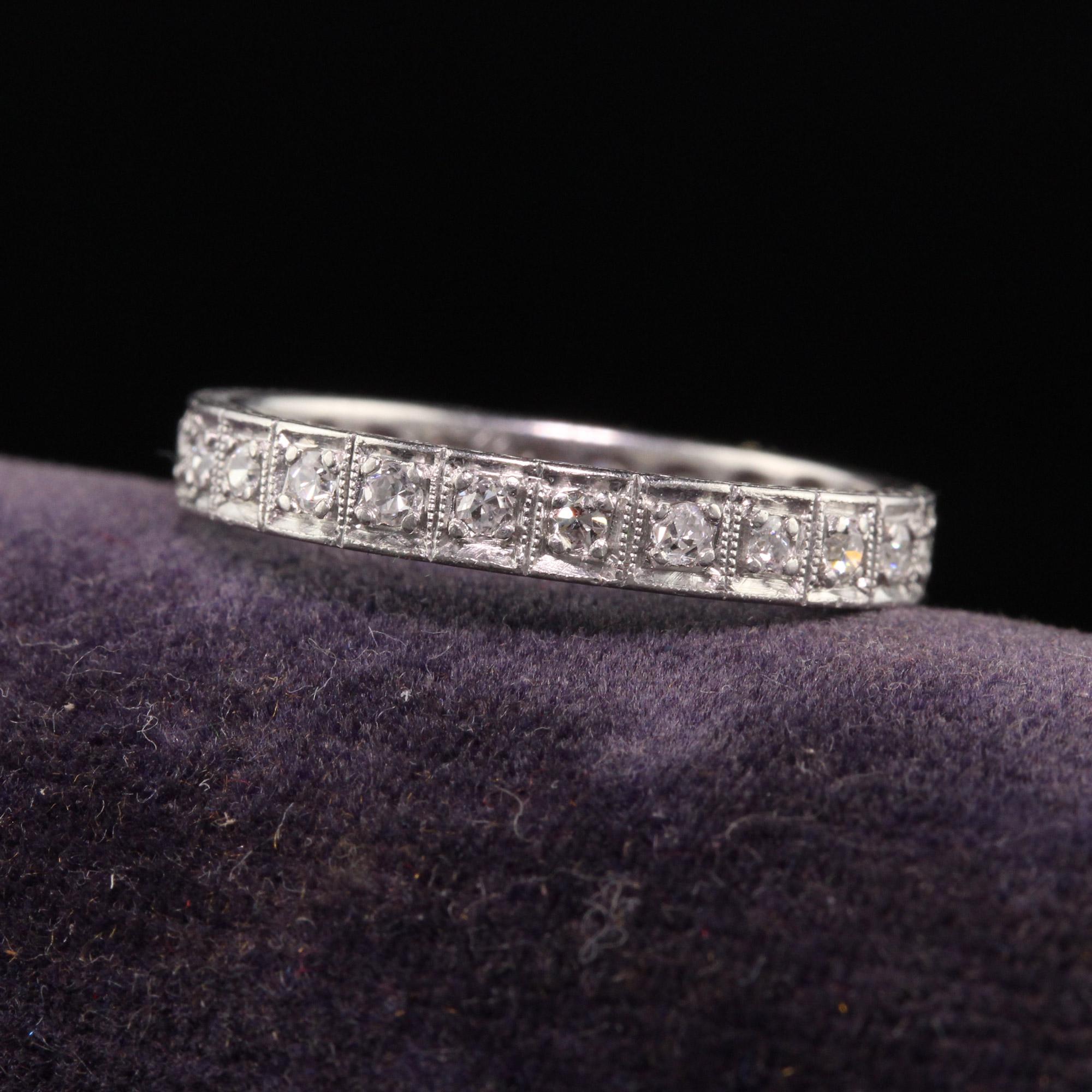 Beautiful Antique Art Deco Platinum Single Cut Diamond Engraved Eternity Band. this beautiful ring is crafted in platinum. There are single cut diamonds going around the entire ring and it is engraved on both sides of the band. It is in good