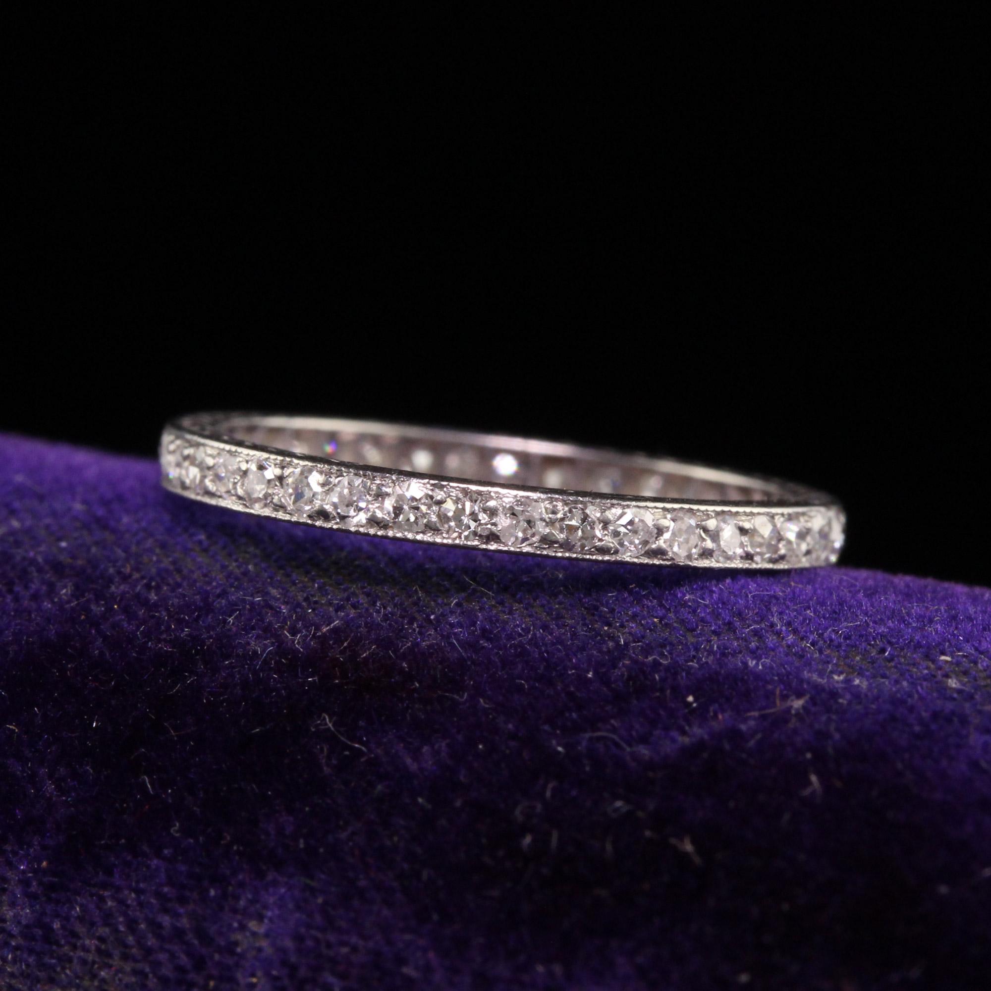 Beautiful Antique Art Deco Platinum Single Cut Diamond Engraved Eternity Band - Size 5 1/2. This gorgeous ring is crafted in platinum. It has gorgeous single cut diamonds going around the entire ring and is engraved on the sides. The ring is in good