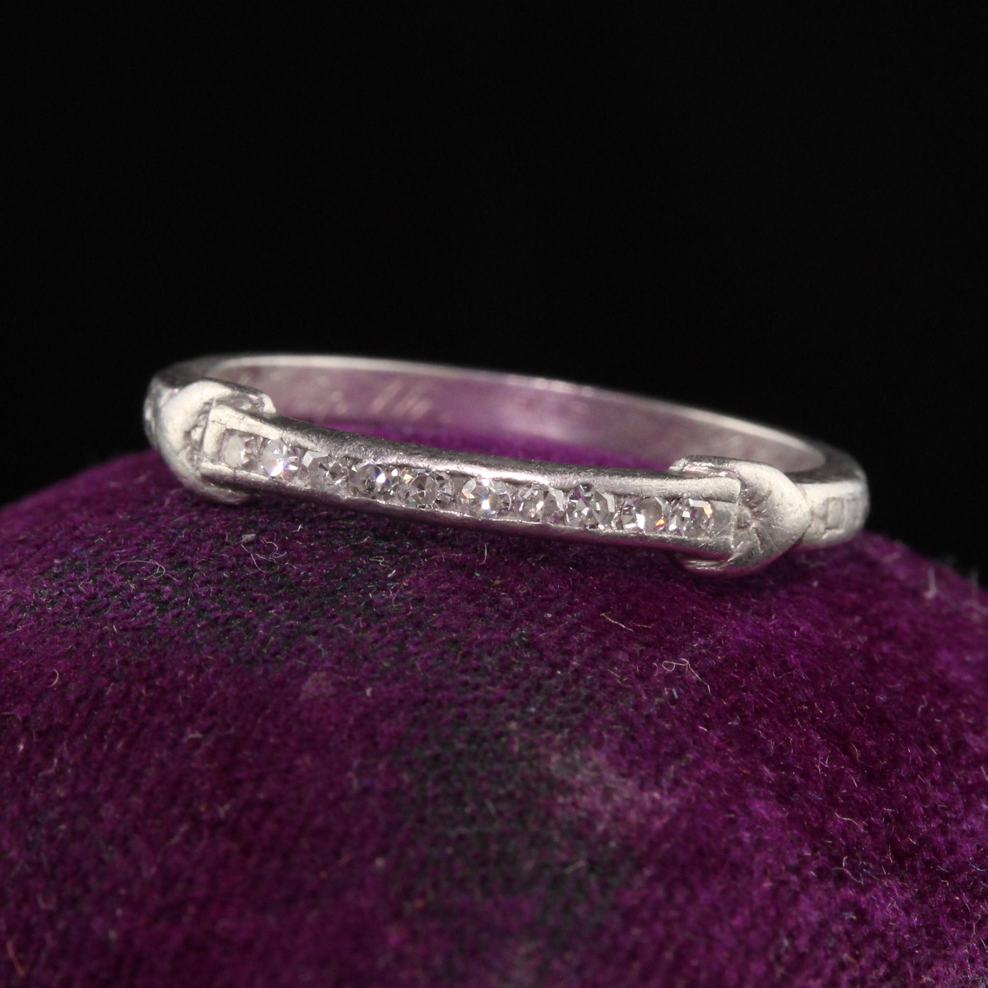 Beautiful Antique Art Deco Platinum Single Cut Diamond Engraved Wedding Band. This gorgeous wedding band has a row of single cut diamonds on the front with a beautiful design on the shank. The inside of the ring is engraved 