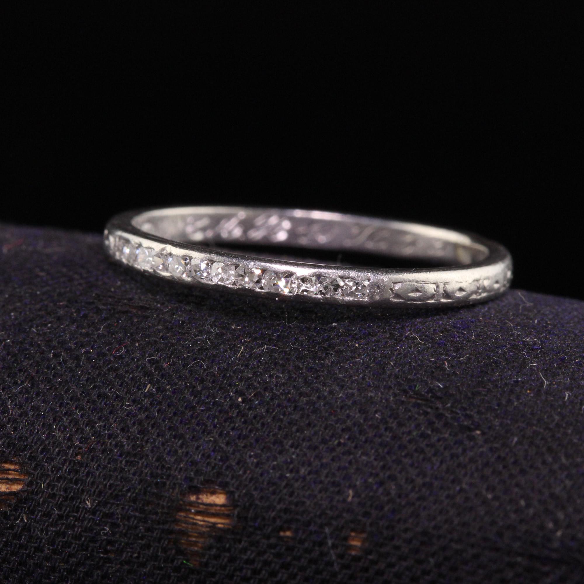 Beautiful Antique Art Deco Platinum Single Cut Diamond Engaved Wedding Band. This beautiful ring is crafted in platinum. This ring has single cut diamonds on the top row with engravings. The inside of the band is engraved 