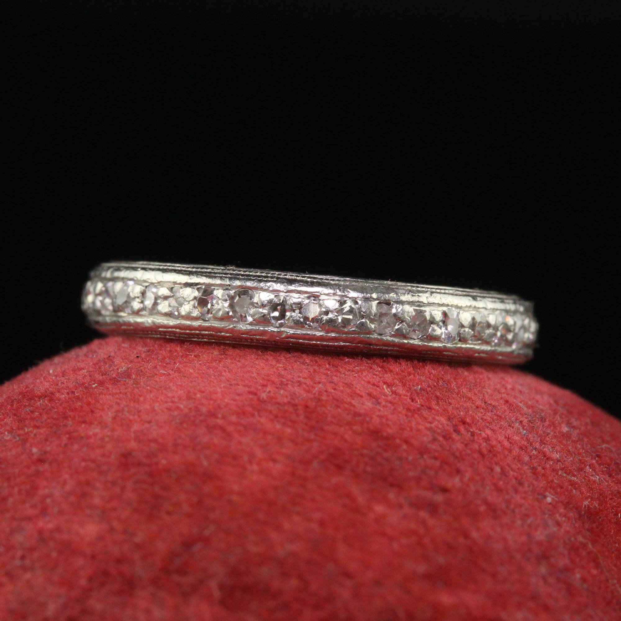 Beautiful Antique Art Deco Platinum Single Cut Diamond Engraved Wedding Band - Size 5 1/2. This beautiful wedding band is crafted in platinum. The ring has single cut diamonds going around the entire ring with a fine miligrain design going around