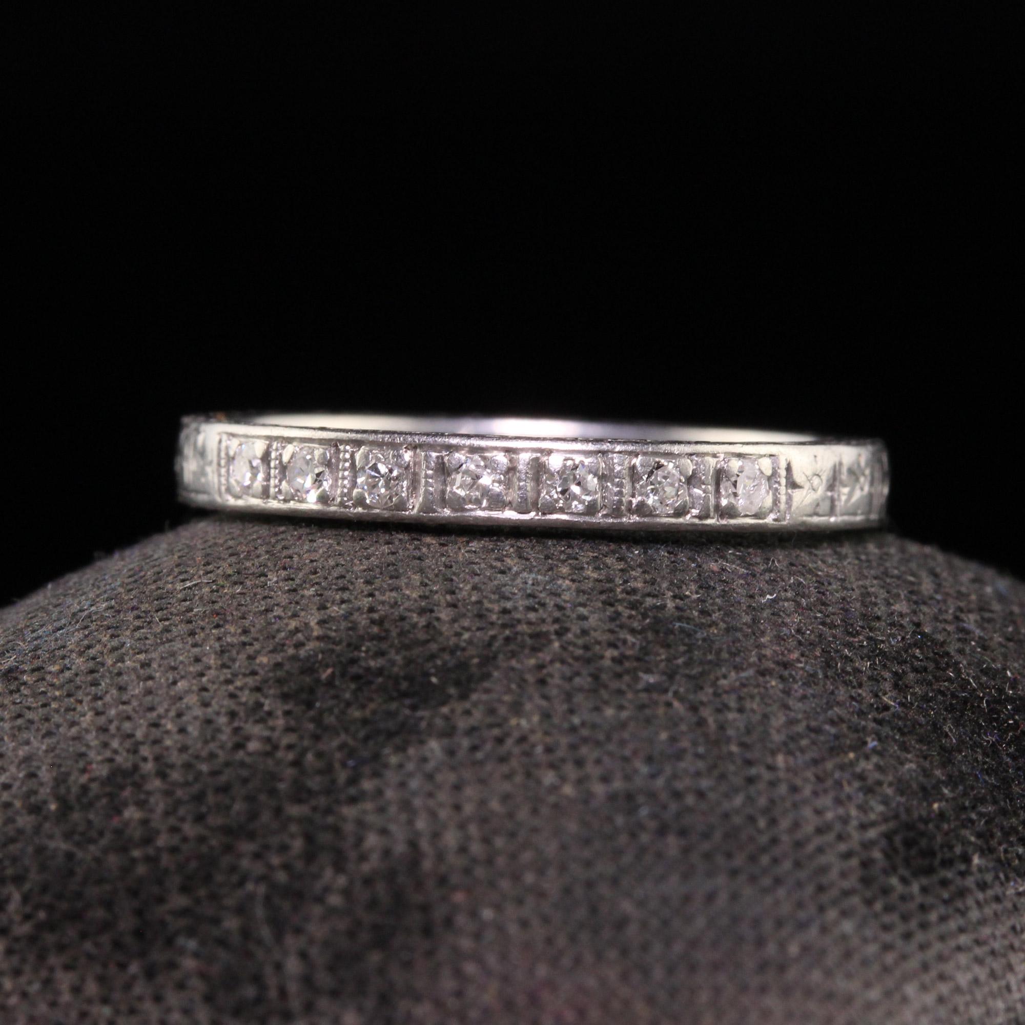 Beautiful Antique Art Deco Platinum Single Cut Diamond Engraved Wedding Band - Size 6 3/4. This beautiful wedding band is crafted in platinum. There are seven single cut diamonds set on top of the band. The ring is beautifully engraved on the top