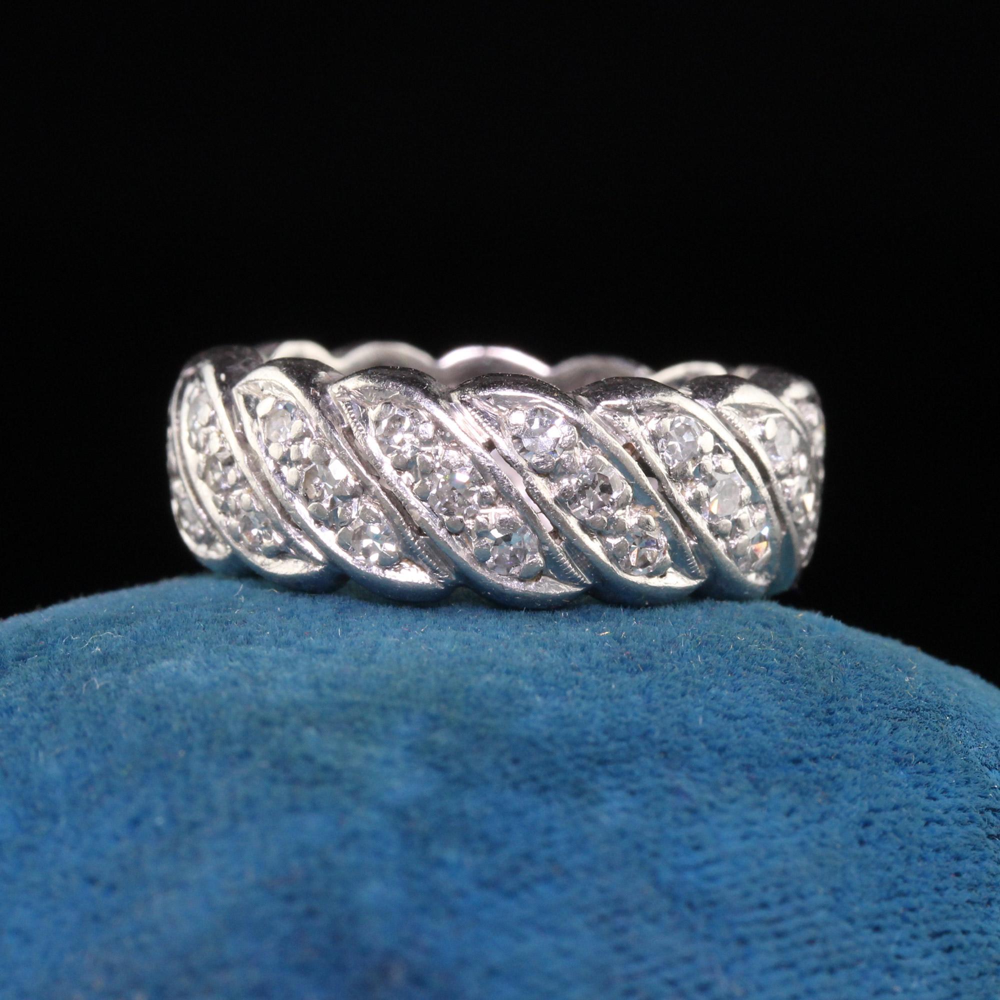 Beautiful Antique Art Deco Platinum Single Cut Diamond Wave Eternity Band - Size 5 1/4. This beautiful ring is crafted in platinum. There are single cut diamonds going around the entire ring and it is in good condition.

Item #R1548

Metal: