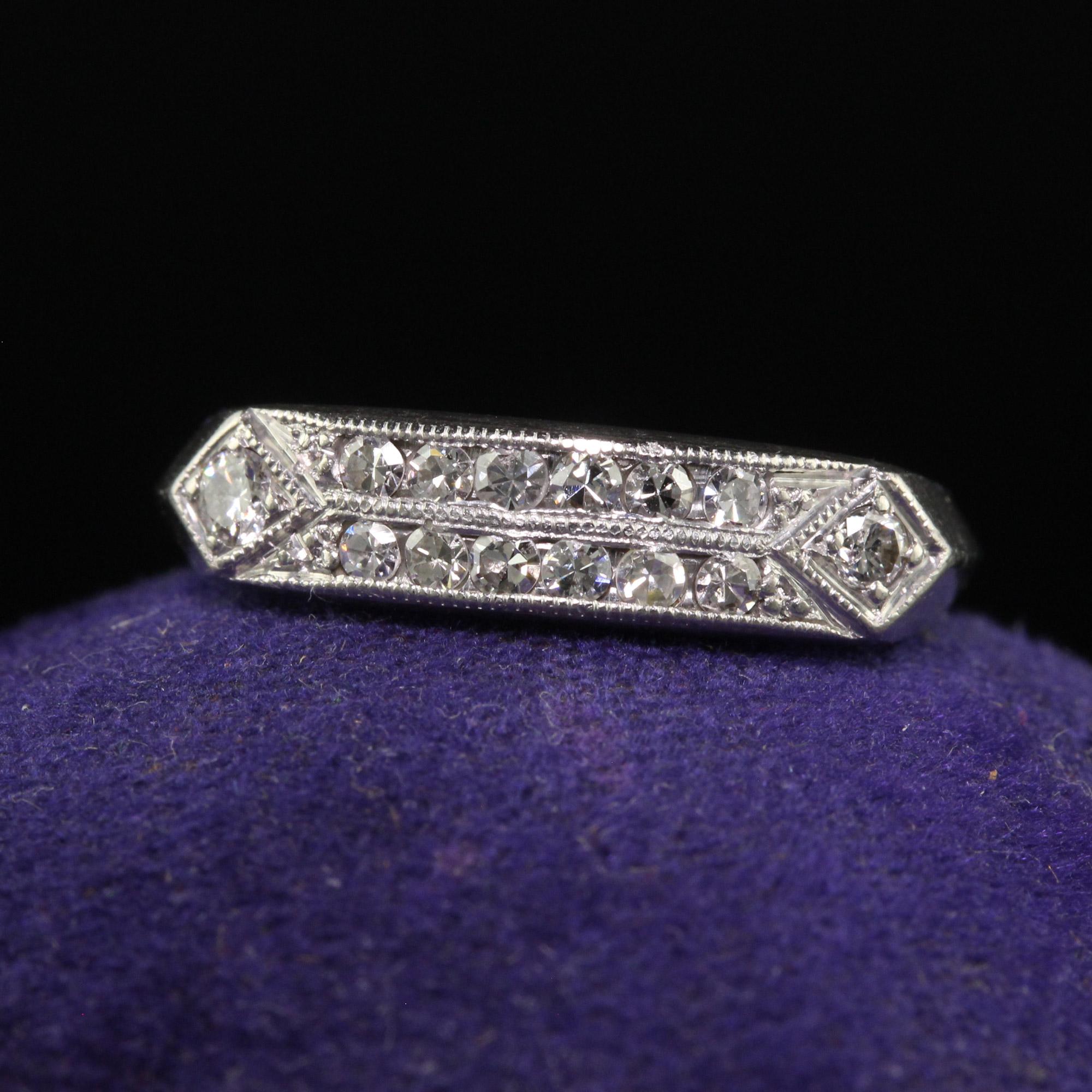 Beautiful Antique Art Deco Platinum Single Cut Diamond Wedding Band - Size 6. This gorgeous antique Art Deco wedding band is crafted in platinum. This ring features two rows of white single cut diamonds with a single cut diamond on each side of the