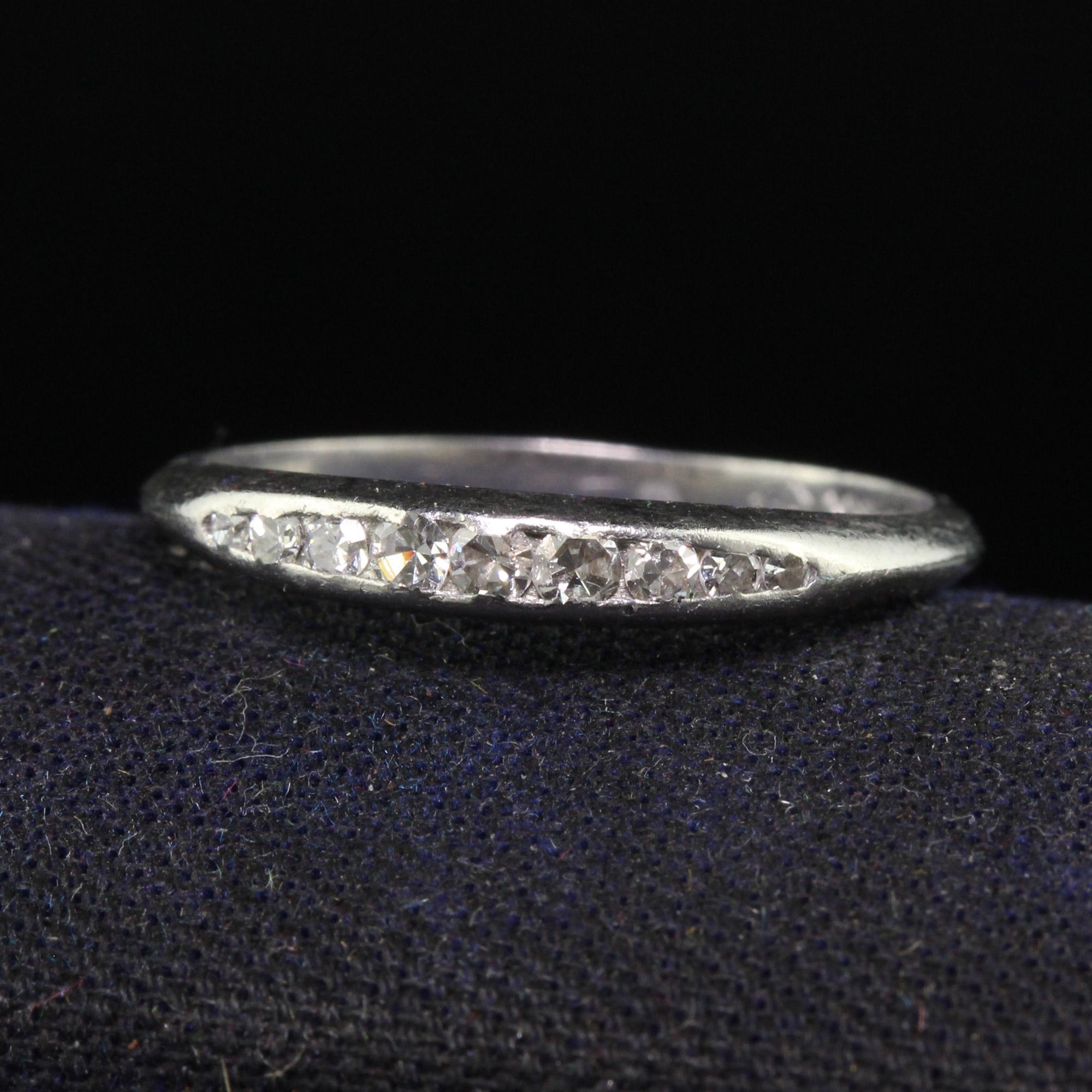 Beautiful Antique Art Deco Platinum Single Cut Graduated Diamond Wedding Band. This classic wedding band is crafted in platinum. There are graduated single cut diamonds on the top of the band and is in very good condition. The ring sits low on the
