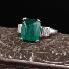 Antique Art Deco Platinum Sugarloaf Emerald and Baguette Diamond Ring, GIA